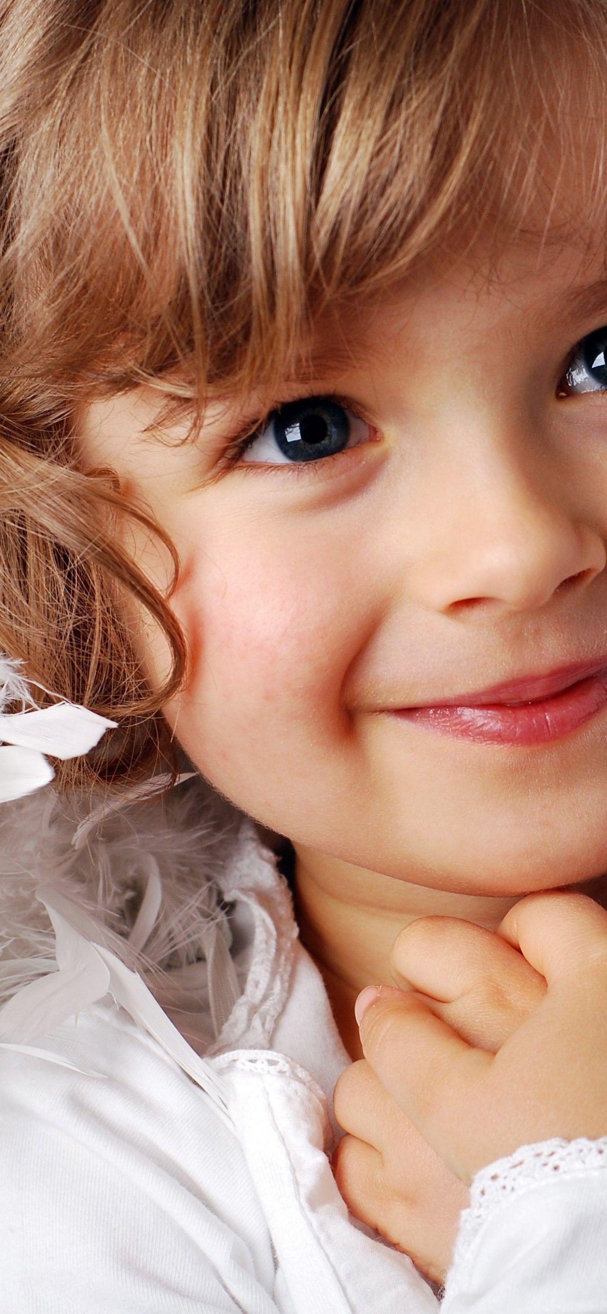 1242x2688 Cute girl 4K Wallpaper, Smiling girl, Happiness, Feathers, White background, Cute