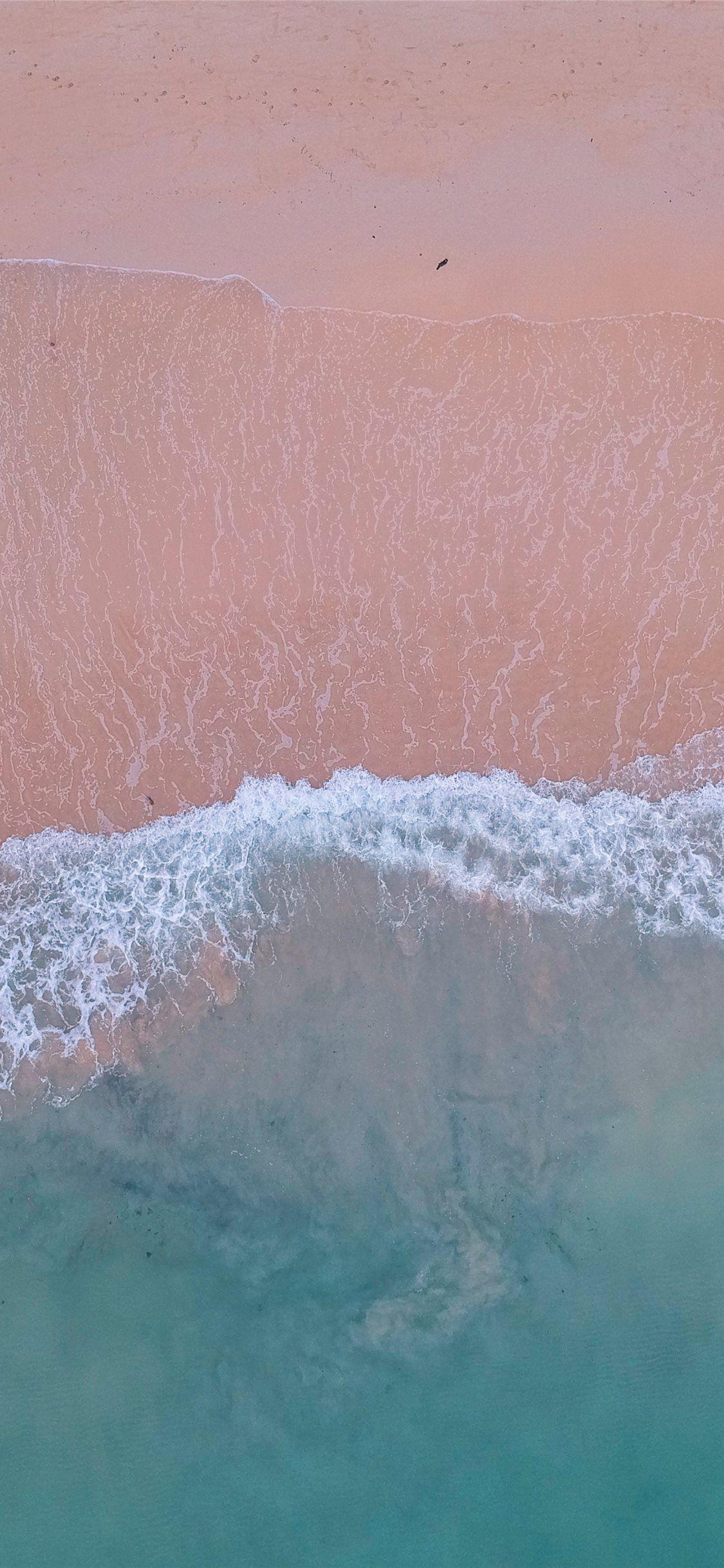 1125x2436 blue ocean waves on shore iPhone 11 Wallpaper Free Download