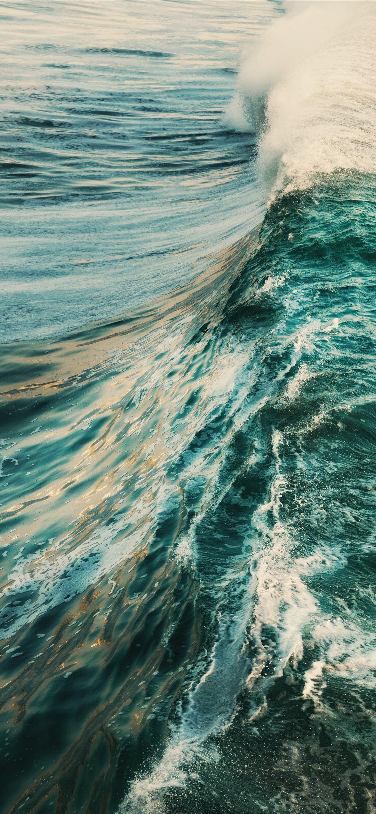 1242x2688 blue ocean waves during daytime iPhone X Wallpaper Free Download