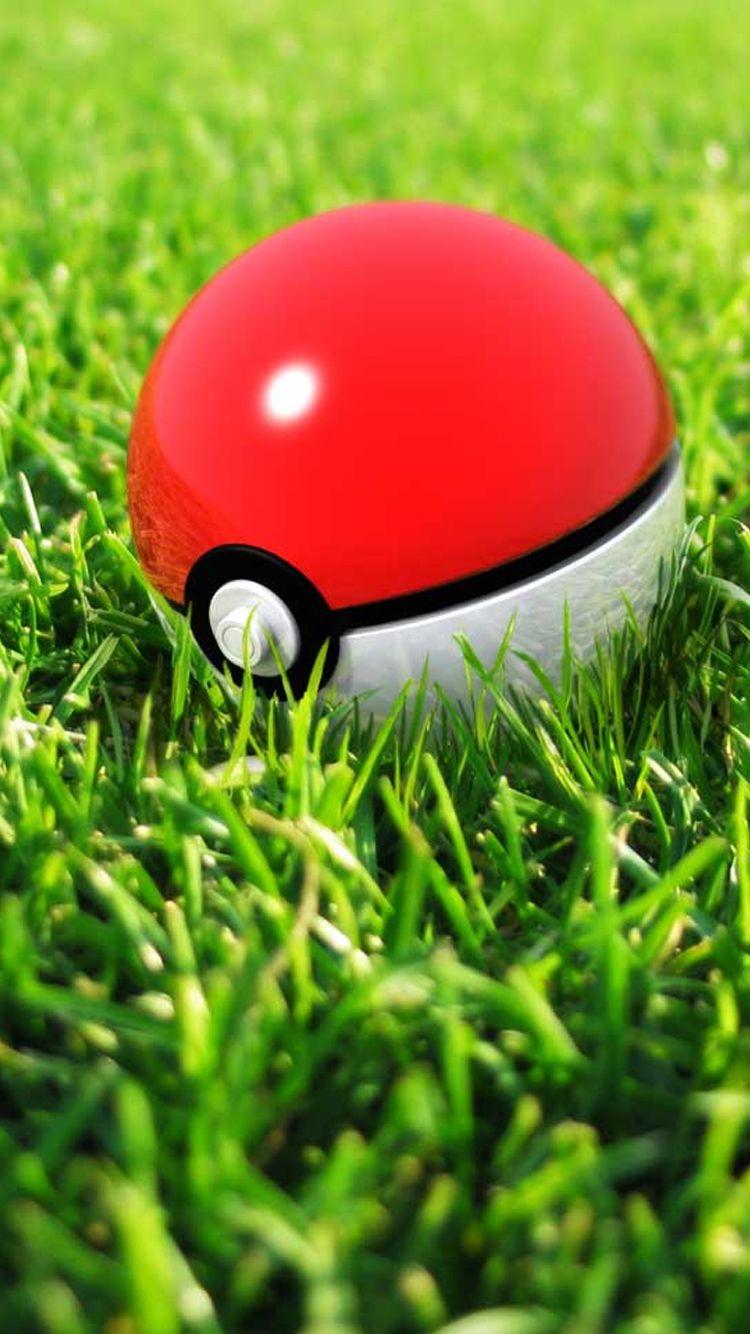 750x1334 Pokeball In Grass iPhone 6 Wallpaper HD
