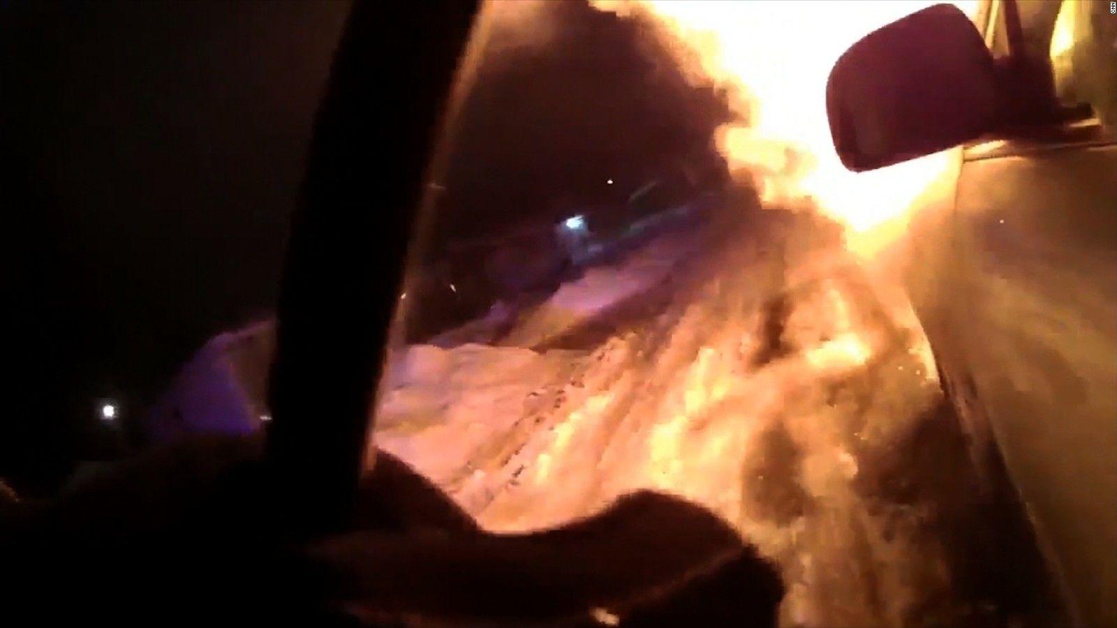 1600x900 Dramatic video shows police rescue trapped woman from burning car