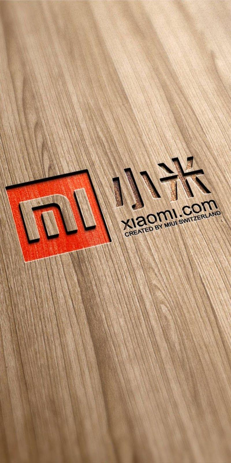 Xiaomi надпись на экране. Xiaomi логотип. Логотип Сяоми вертикальные. Обои с логотипом Xiaomi. Красивый логотип Xiaomi.