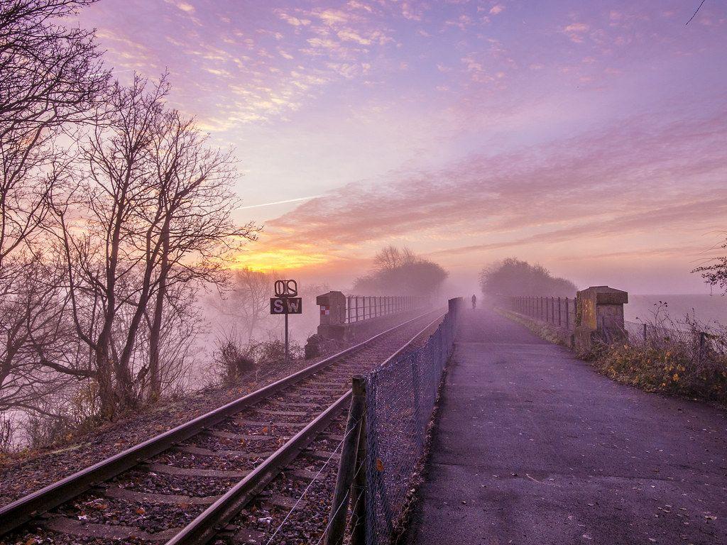 1024x768 sunrise frosty pastel colours cycle path. winter sunrise an