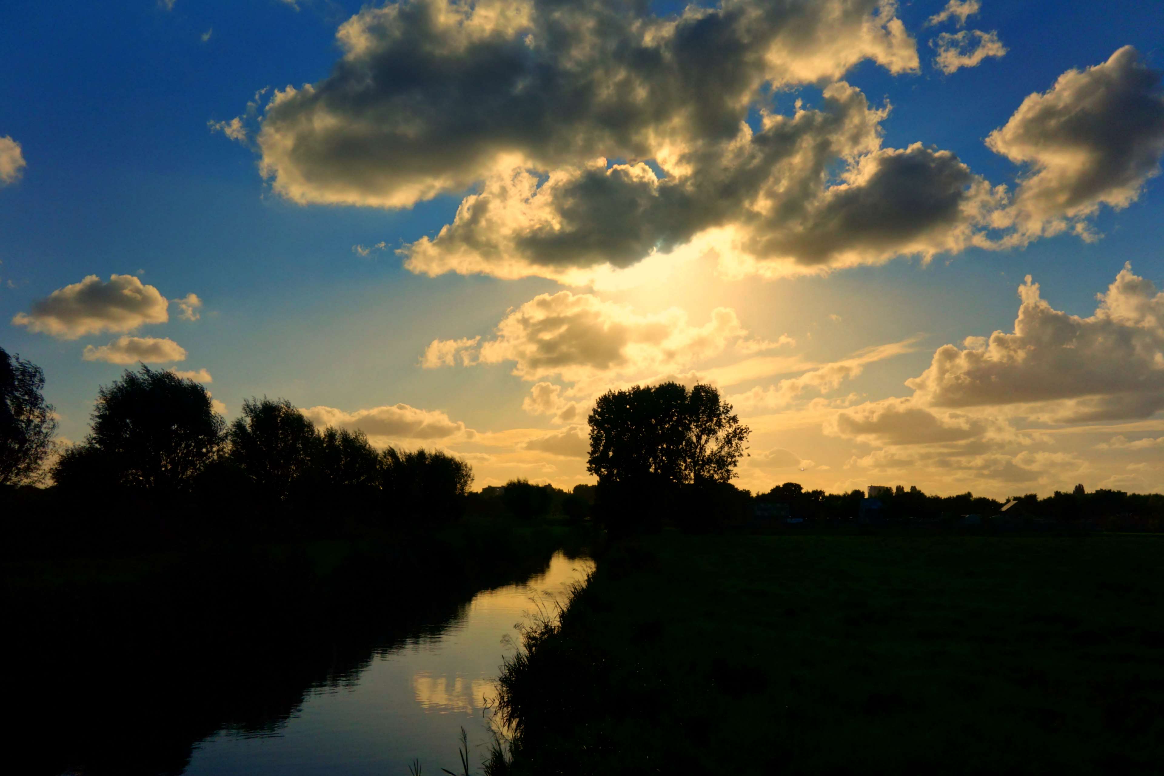 3840x2558 clouds, holland, landscape, silhouette, sky, sun, sunset 4k wallpaper and background. Free stock image. Tokkoro.com Amazing HD Wallpaper