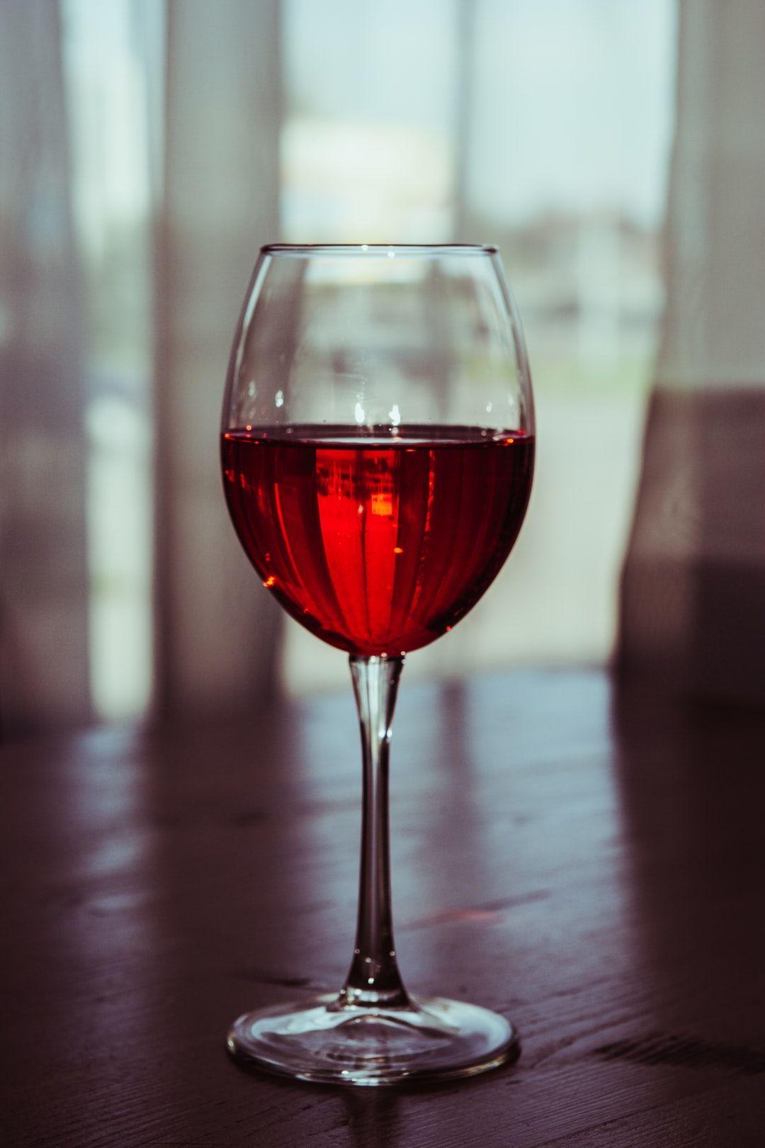 1080x1620 clear wine glass with wine photo