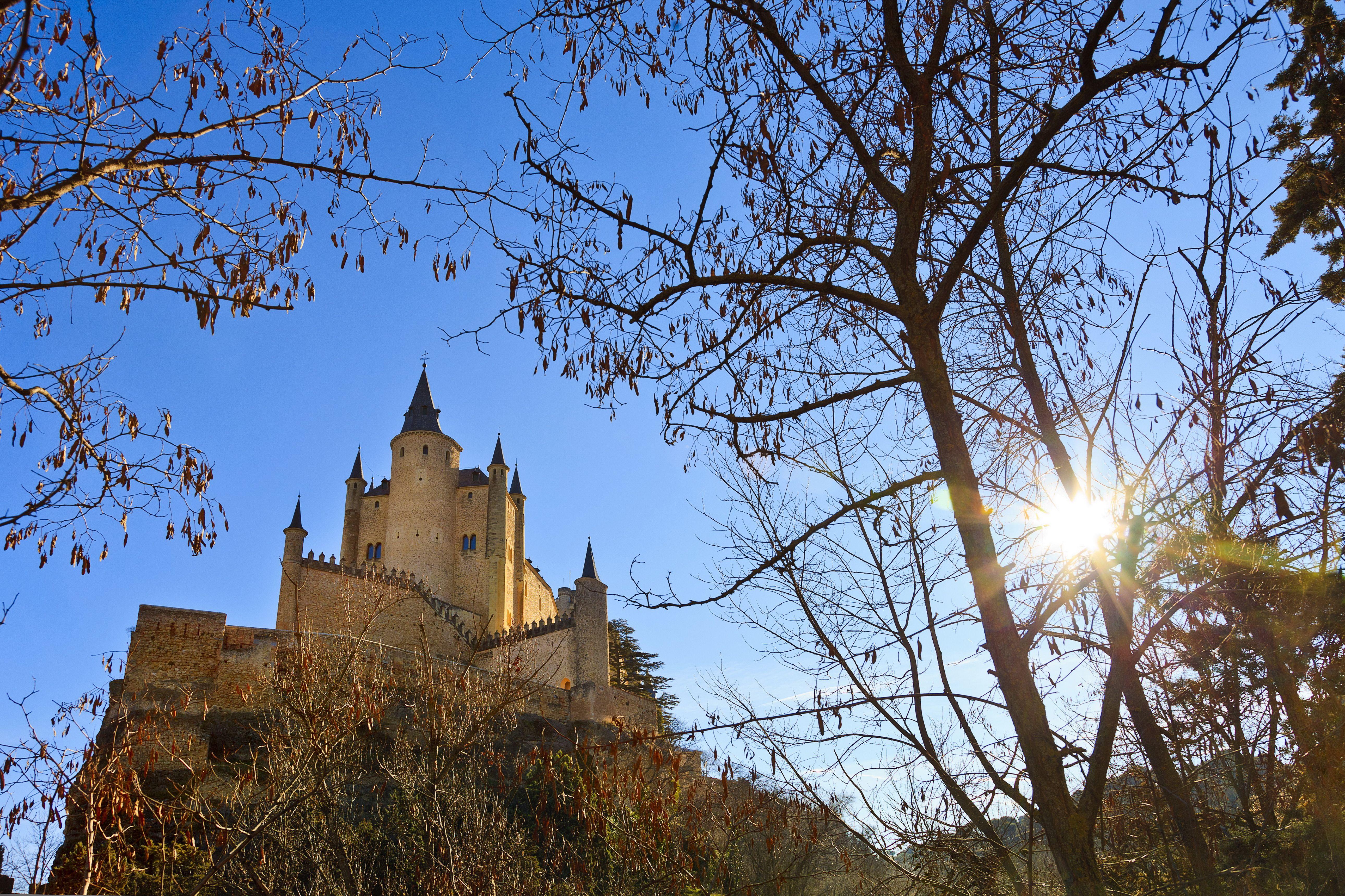 5160x3440 Wallpaper Spain Segovia Sun castle Branches Trees Cities 5160x3440