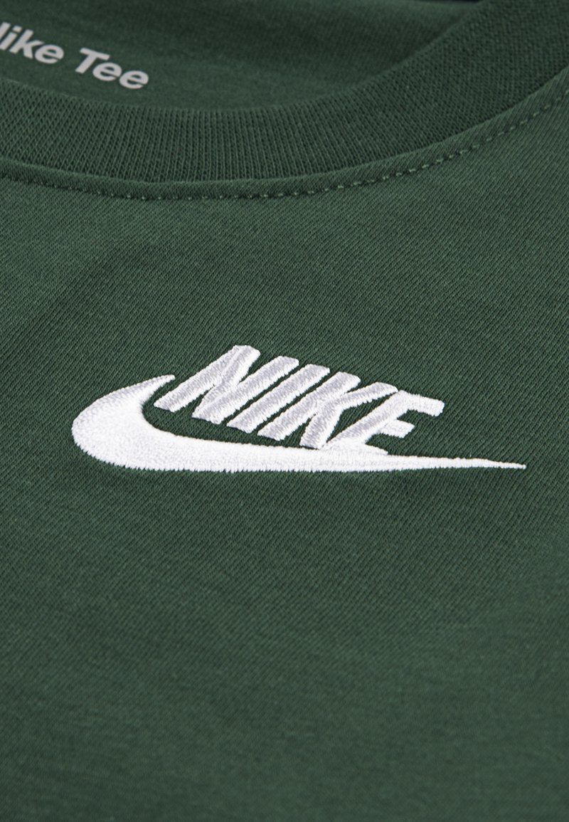 800x1155 Dark Green Nike Logo Nike Brand Neon Green Wallpaper Nike Logo Green Nike Wallpaper