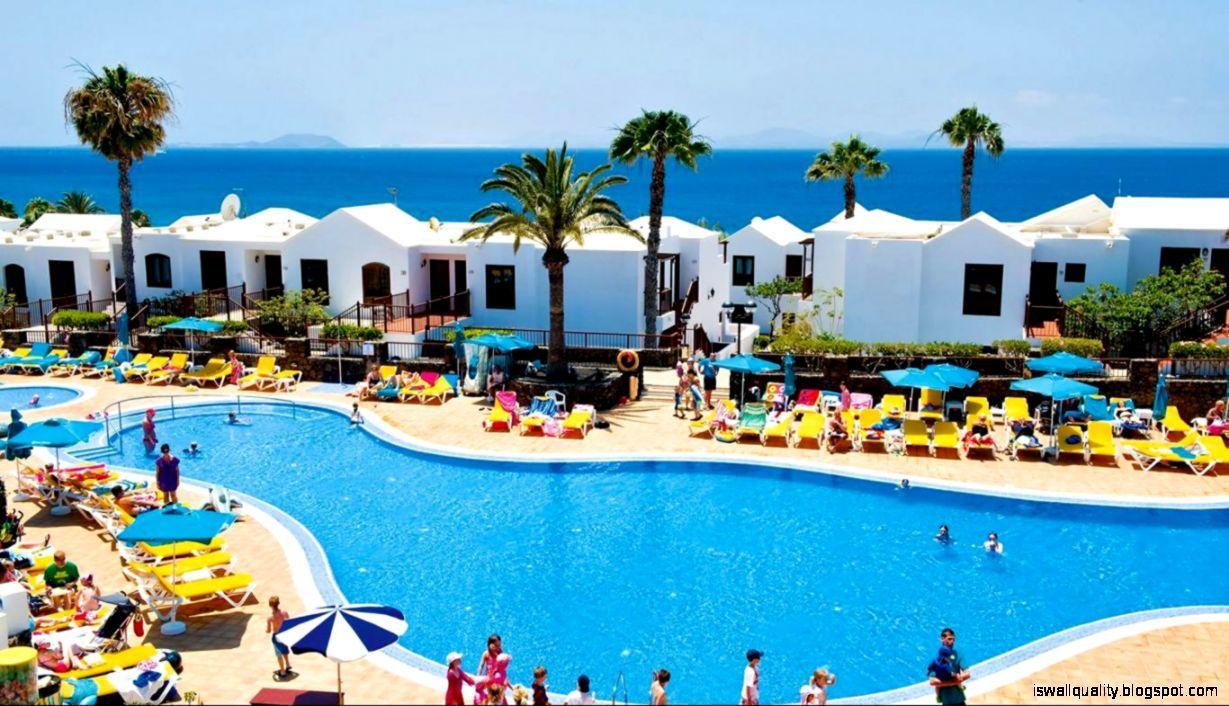1229x706 Holiday Village Beach Wallpaper