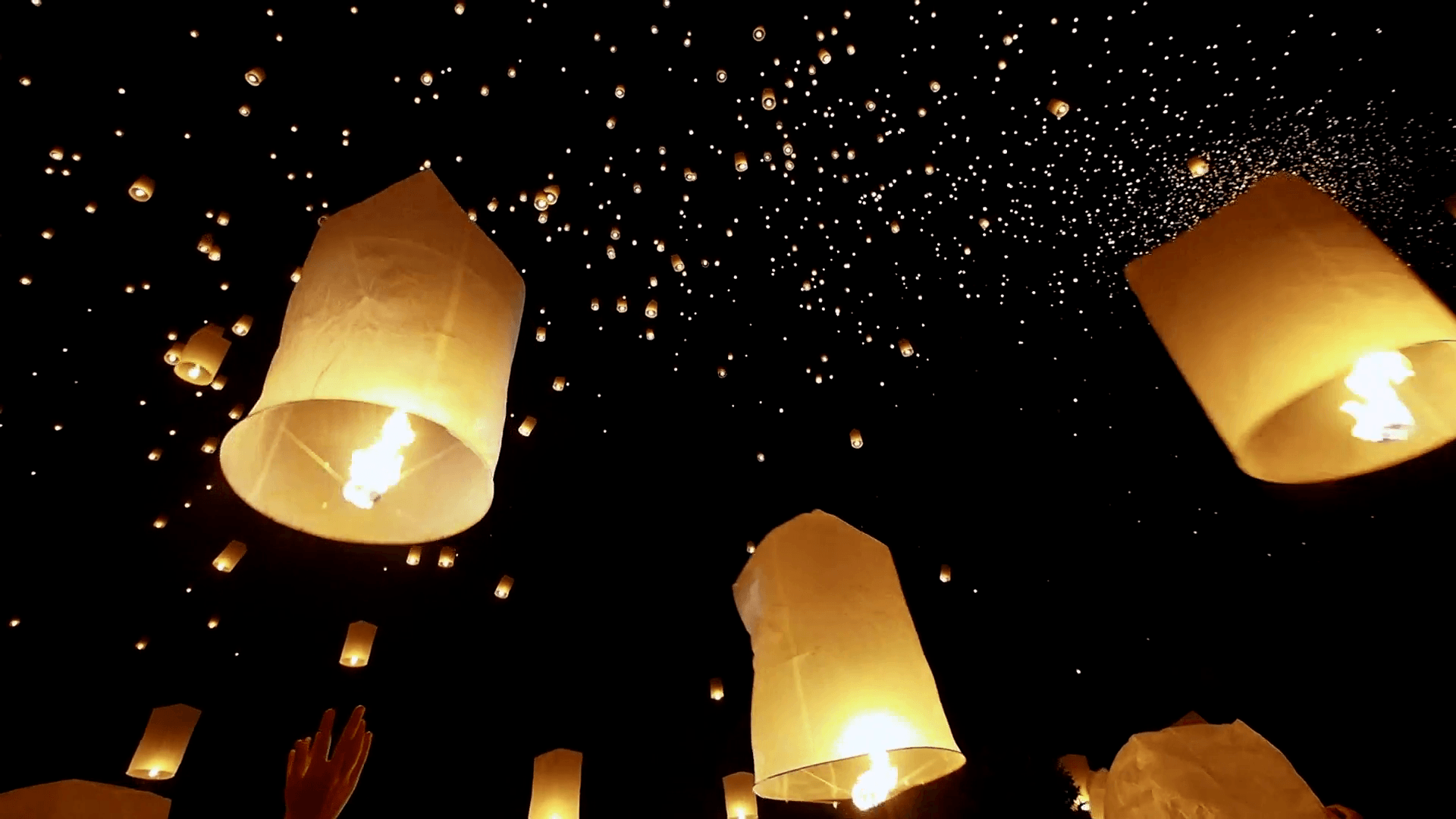 1920x1080 Loi Krathong Festival, Hands Releasing Floating Lantern Into