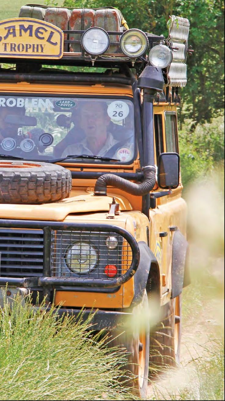 736x1309 Orange Jeep Off Roading Adventure. Camel Trophy Land Rover Wallpaper, Yellow Land Rover Adventure, Vintage