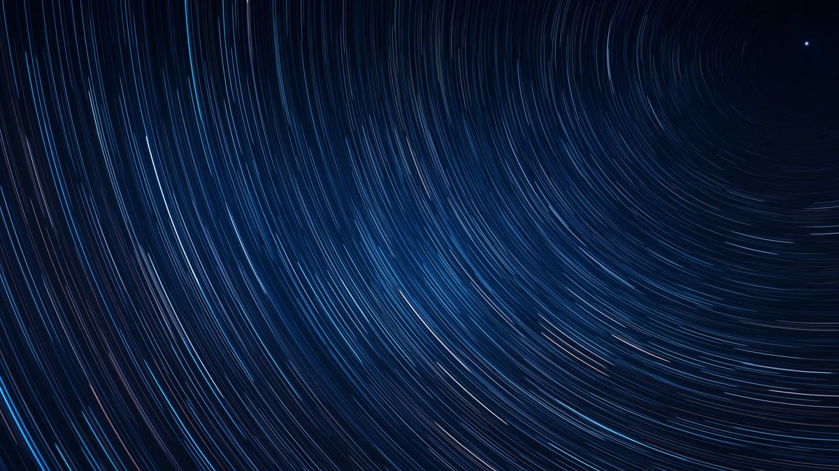 1200x673 Star Trail Night Sky Mural Wallpaper. Blue, Black and White Night Sky