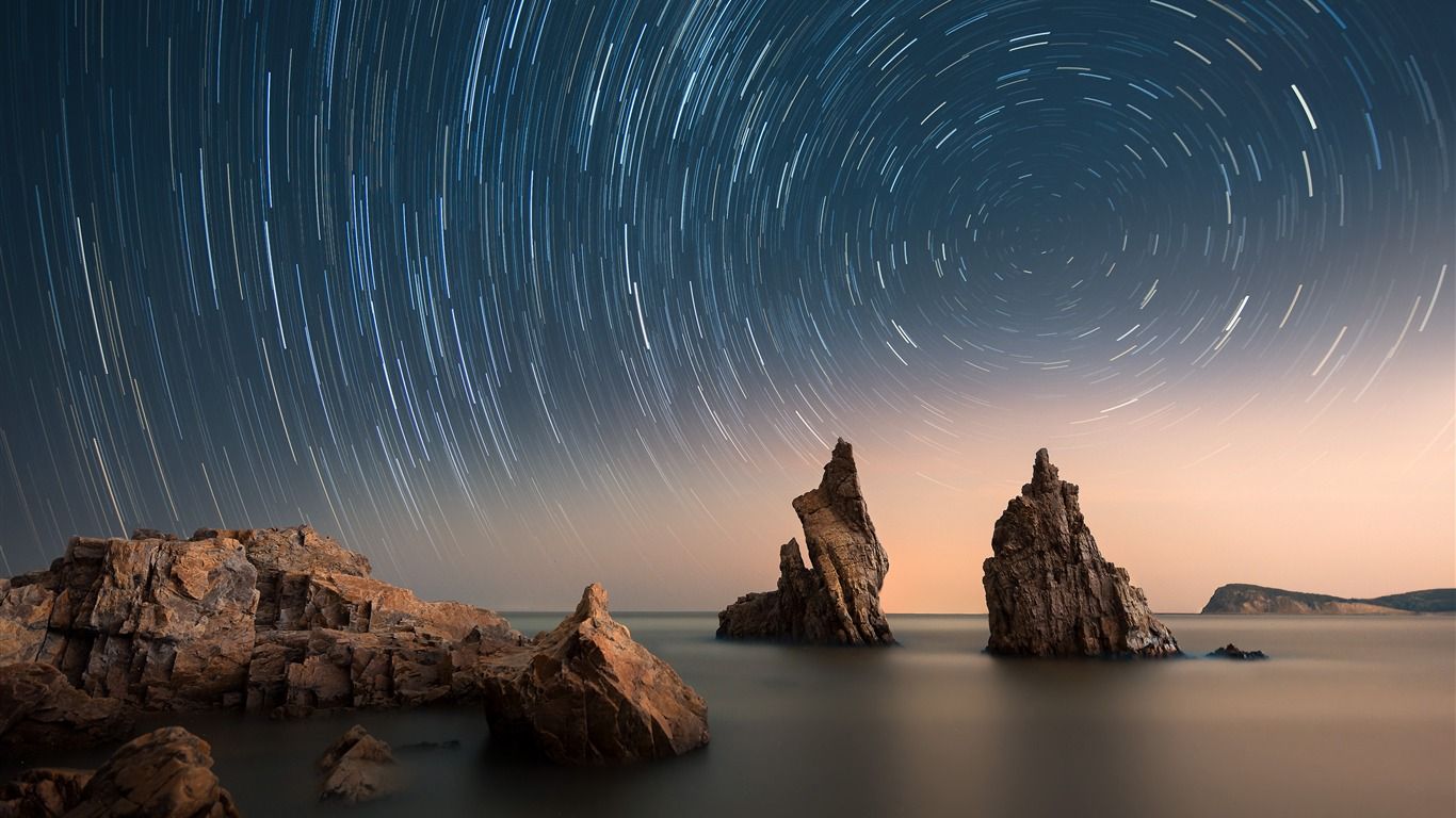 1366x768 Ocean reef night star trail landscape photo