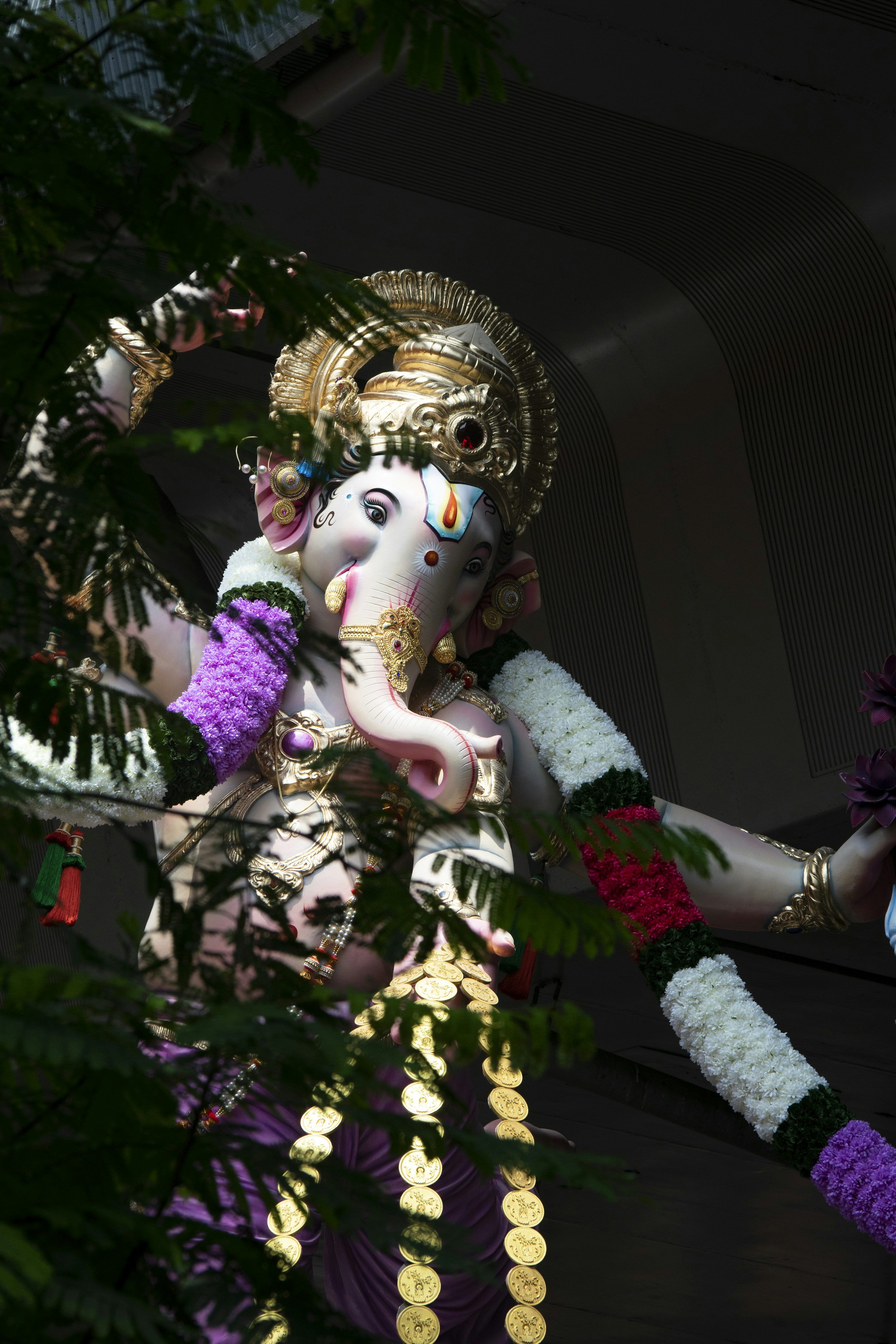 3000x4500 A statue of an indian god with a flute photo