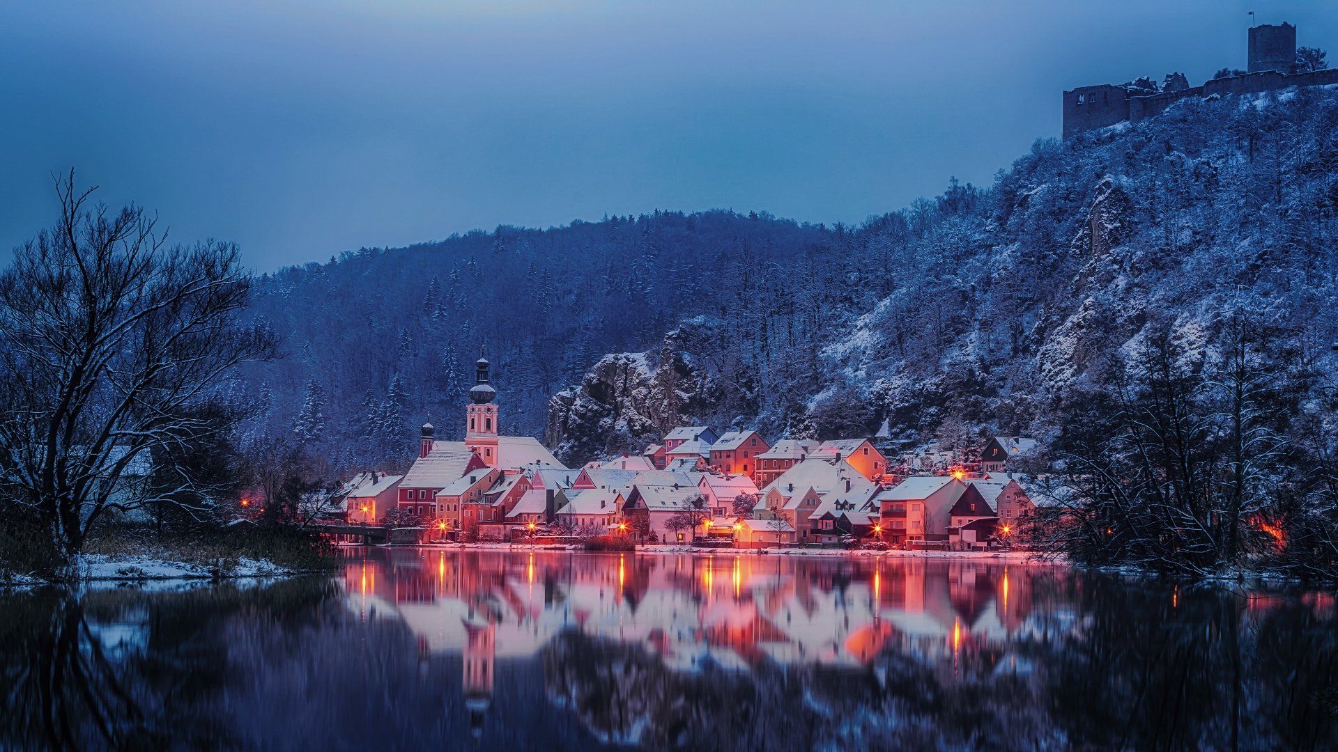 1920x1080 Tranquil German Village at Night by the Reflective Lake