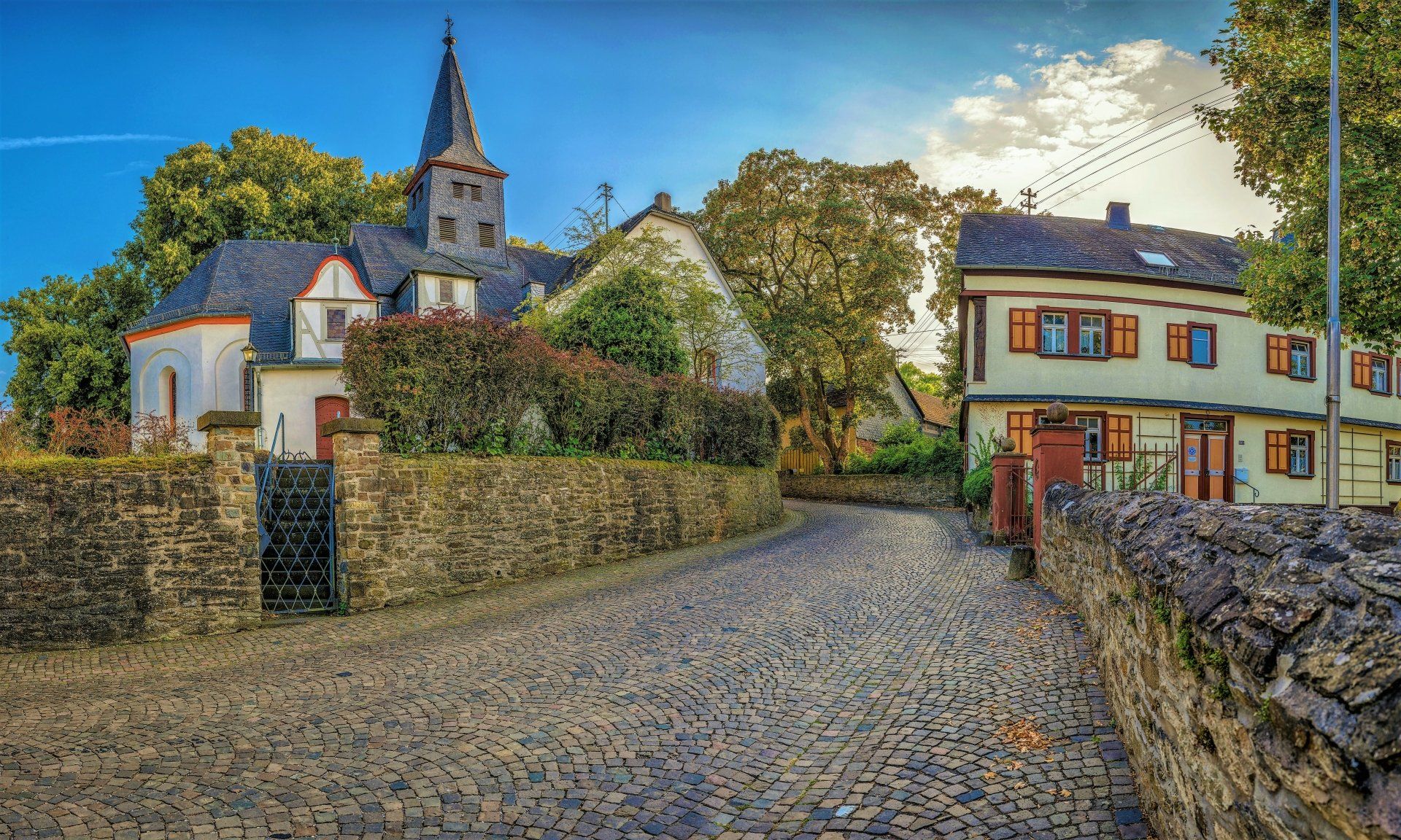 1920x1152 Cobblestone German Village Street with Quaint Houses