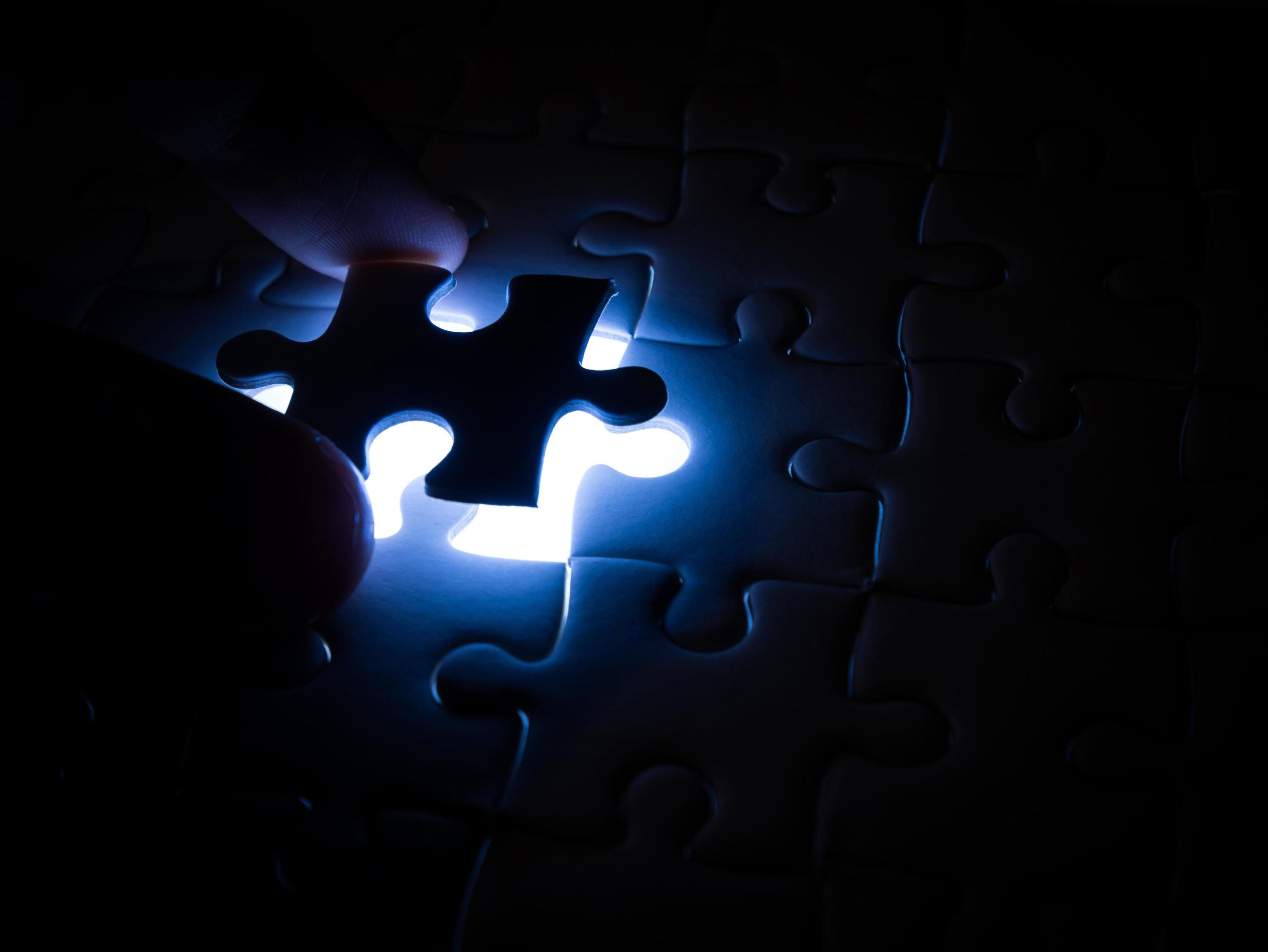 2610x1960 Missing Jigsaw puzzle piece with lighting, business concept for completing the finishing puzzle piece