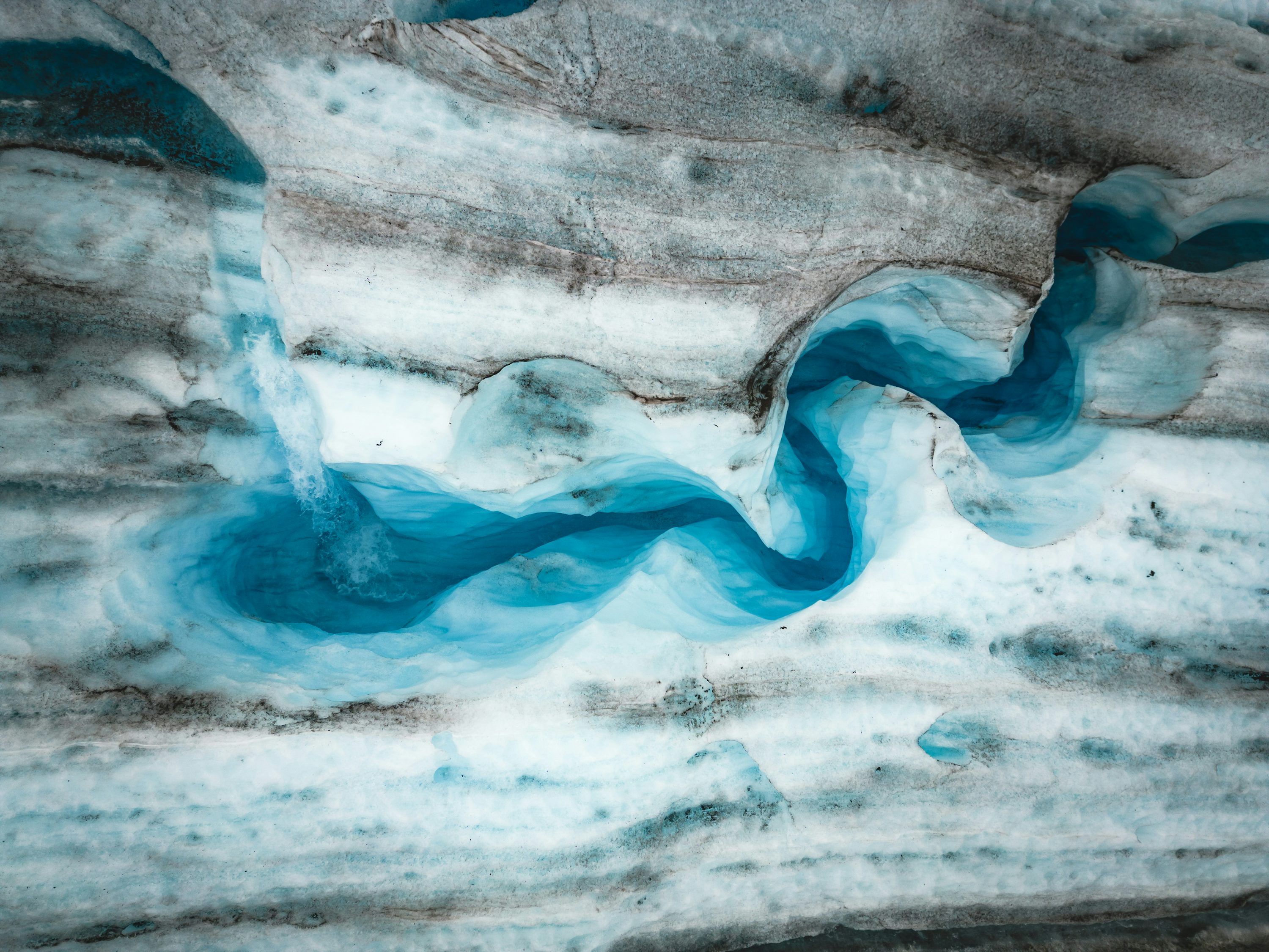 3000x2250 A painting of a river running through a rocky landscape