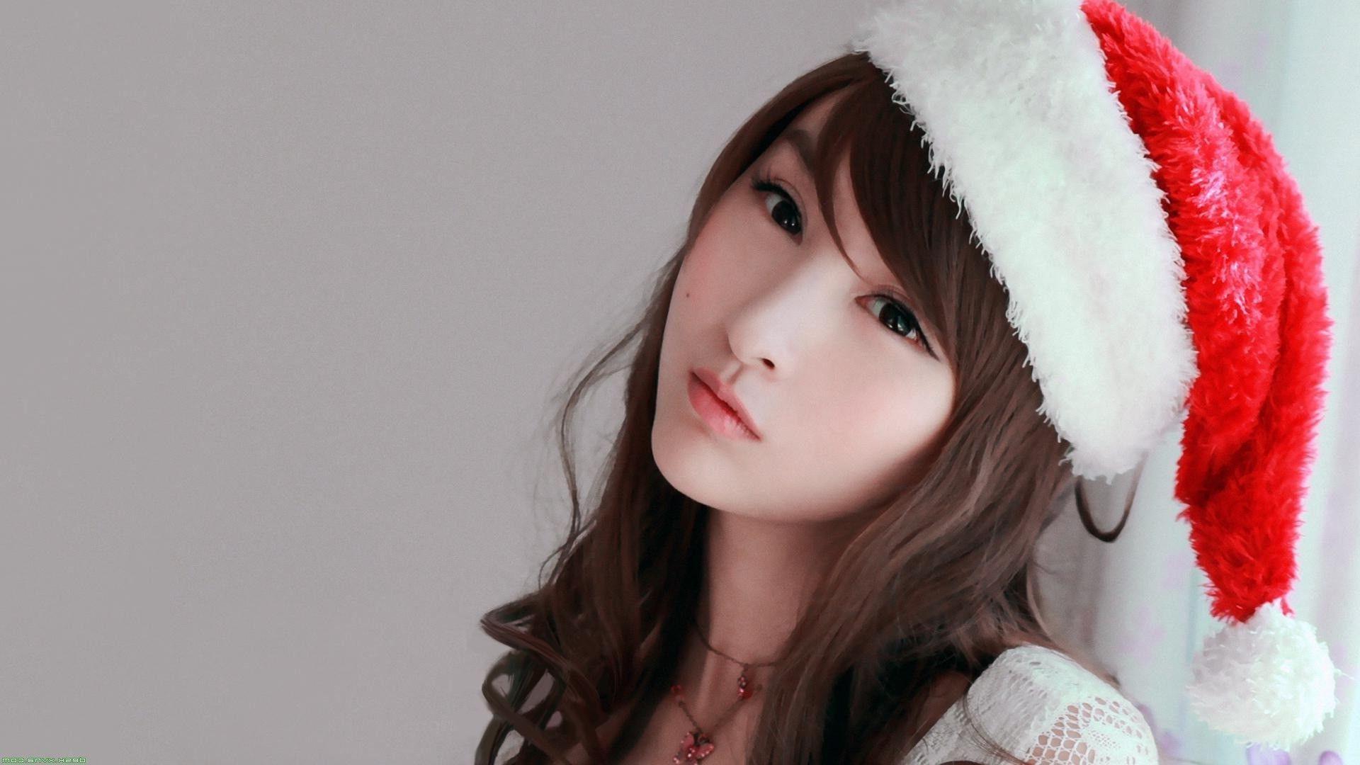 1920x1080 Brunette Girl Wearing A Christmas Hat Wallpaper Wearing Long Santa Hat