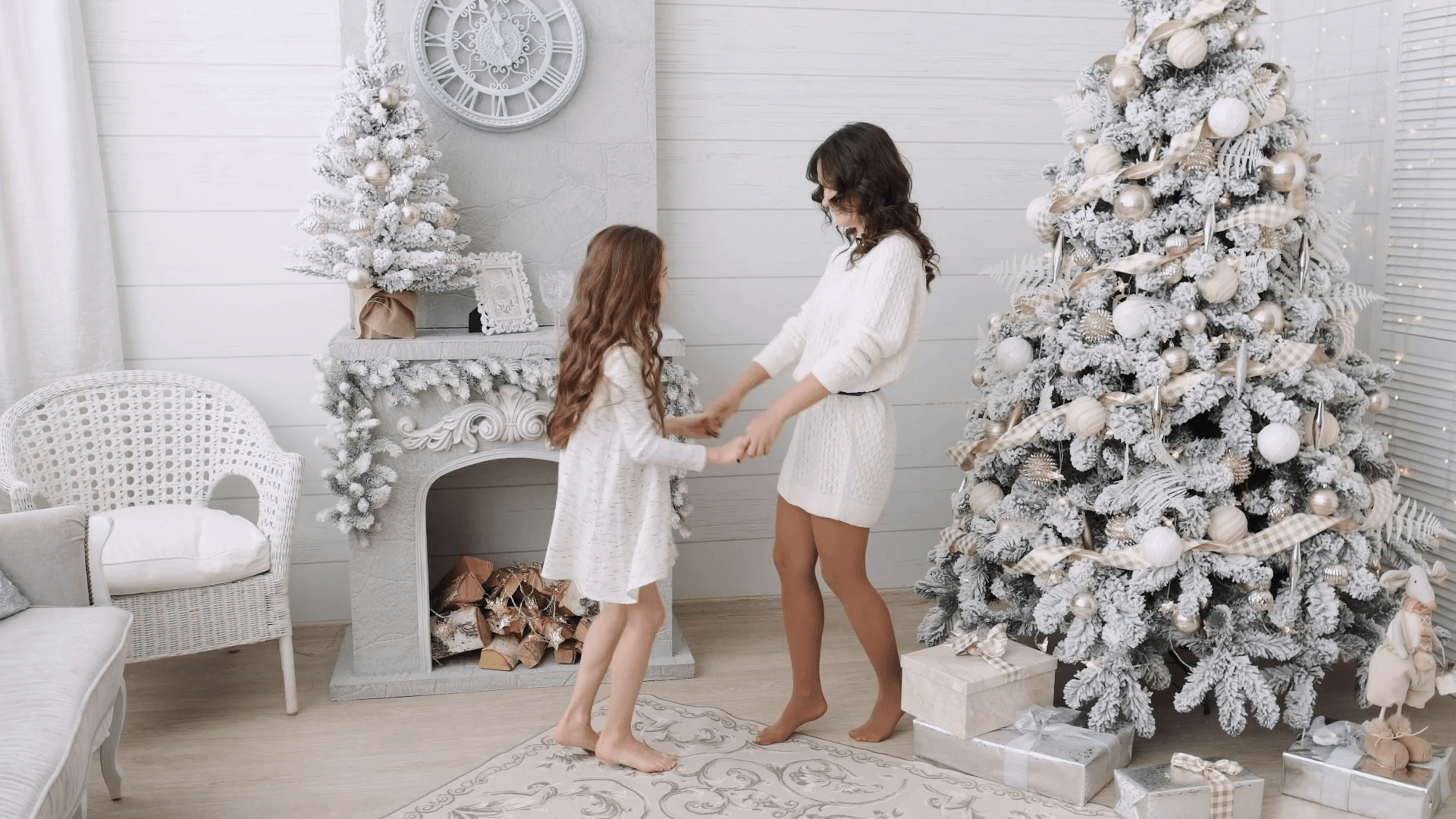 1920x1080 Mom and daughter on the background of a beautiful Christmas interior. family mom and daughter next to the fireplace dance, hug Stock Video Footage
