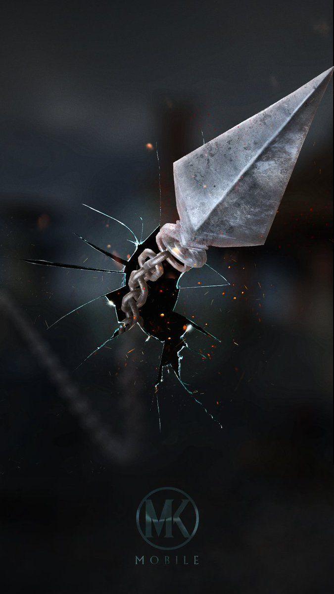 675x1200 Mortal Kombat Mobile: Your phone screen isn't cracked. This is just a badass Scorpion wallpaper. #MKMobile