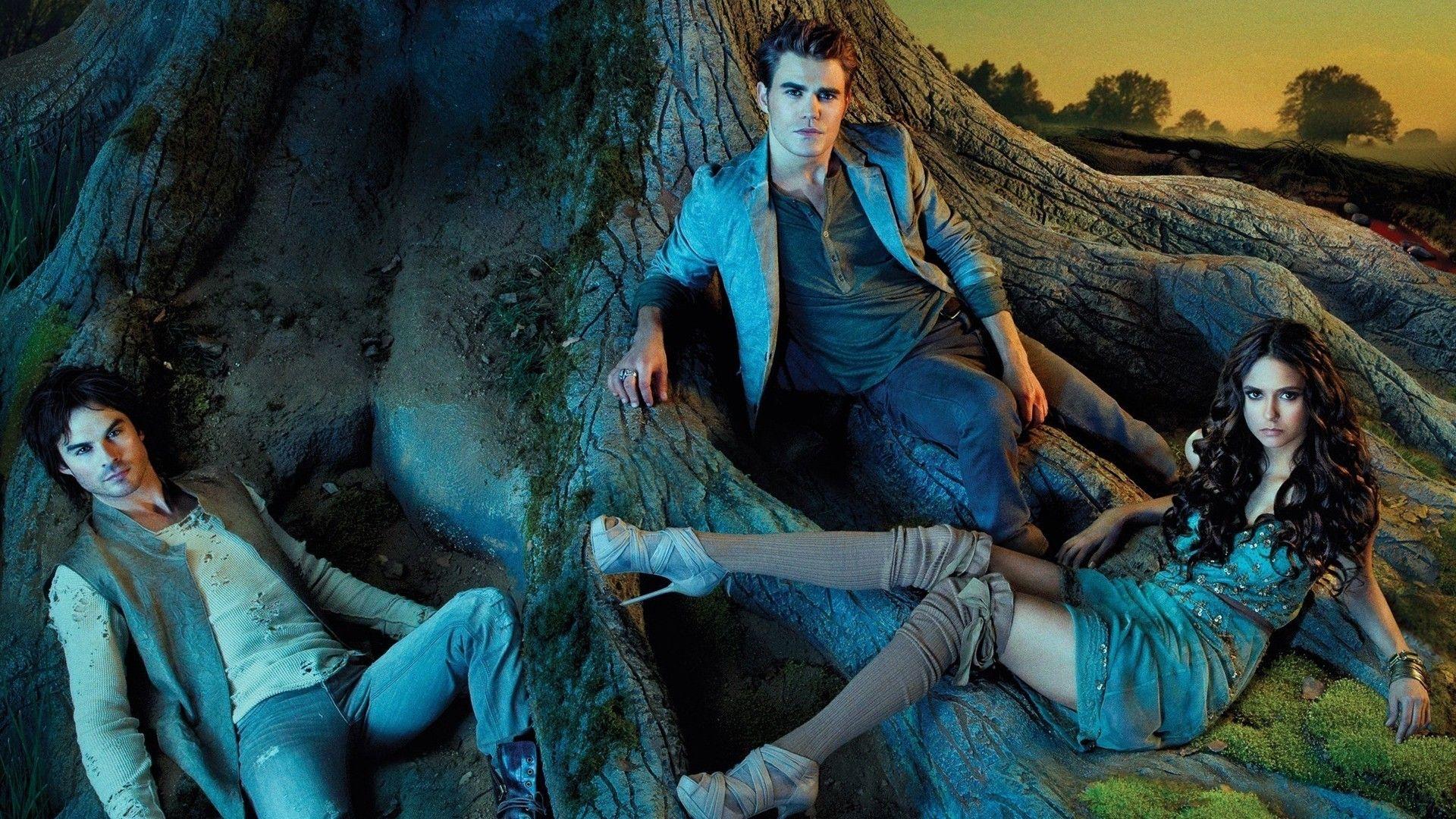 1920x1080 Damon Salvatore Stefan Salvatore Elena Gilbert Are Leaning On Tree Root HD The Vampire Diaries Wallpaper