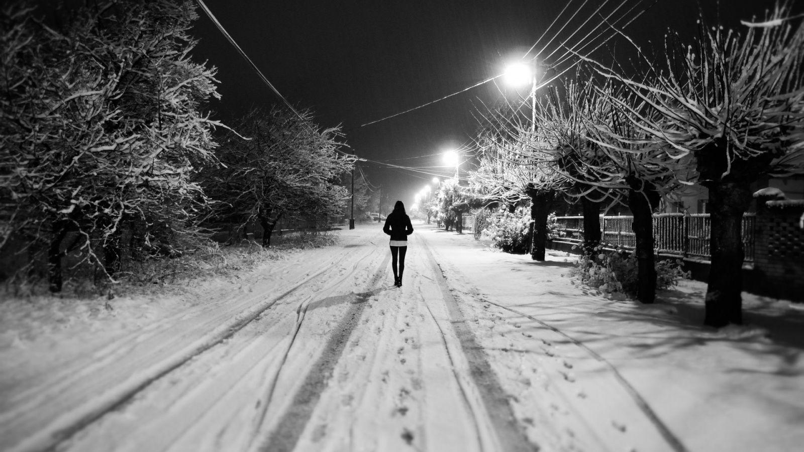1600x900 White Snow Night Alone Girl Wallpaper