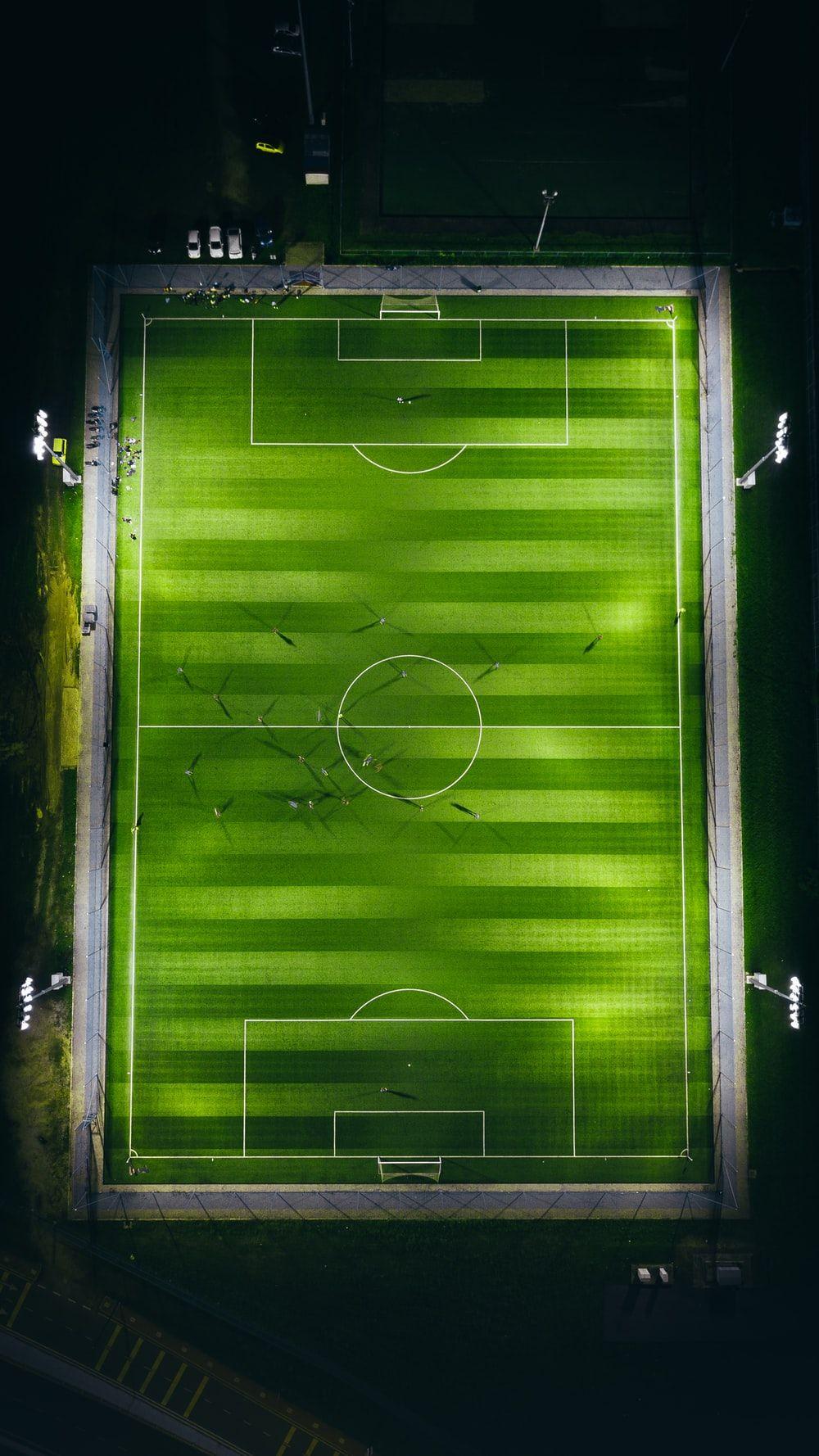 1000x1778 Bird's Eye View Photography Of Green Soccer Field With Lights Photo