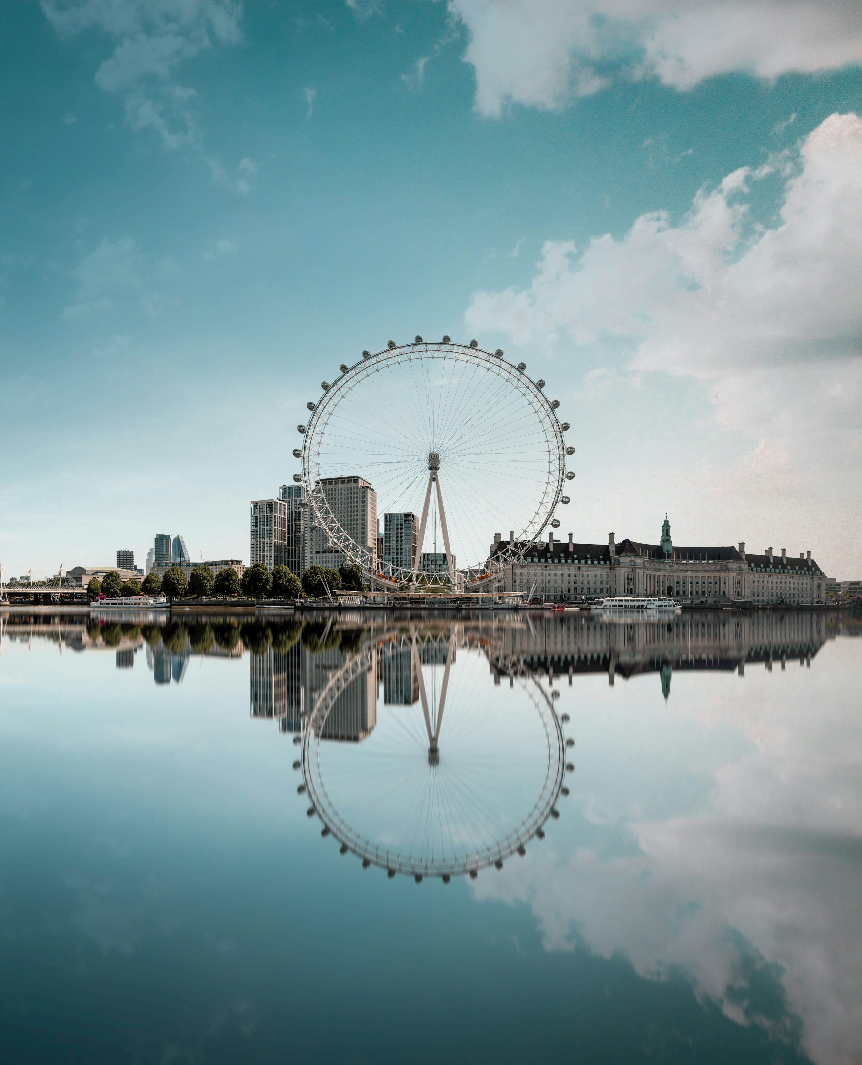 3000x3706 Ferris wheel beside body of water under blue sky during daytime