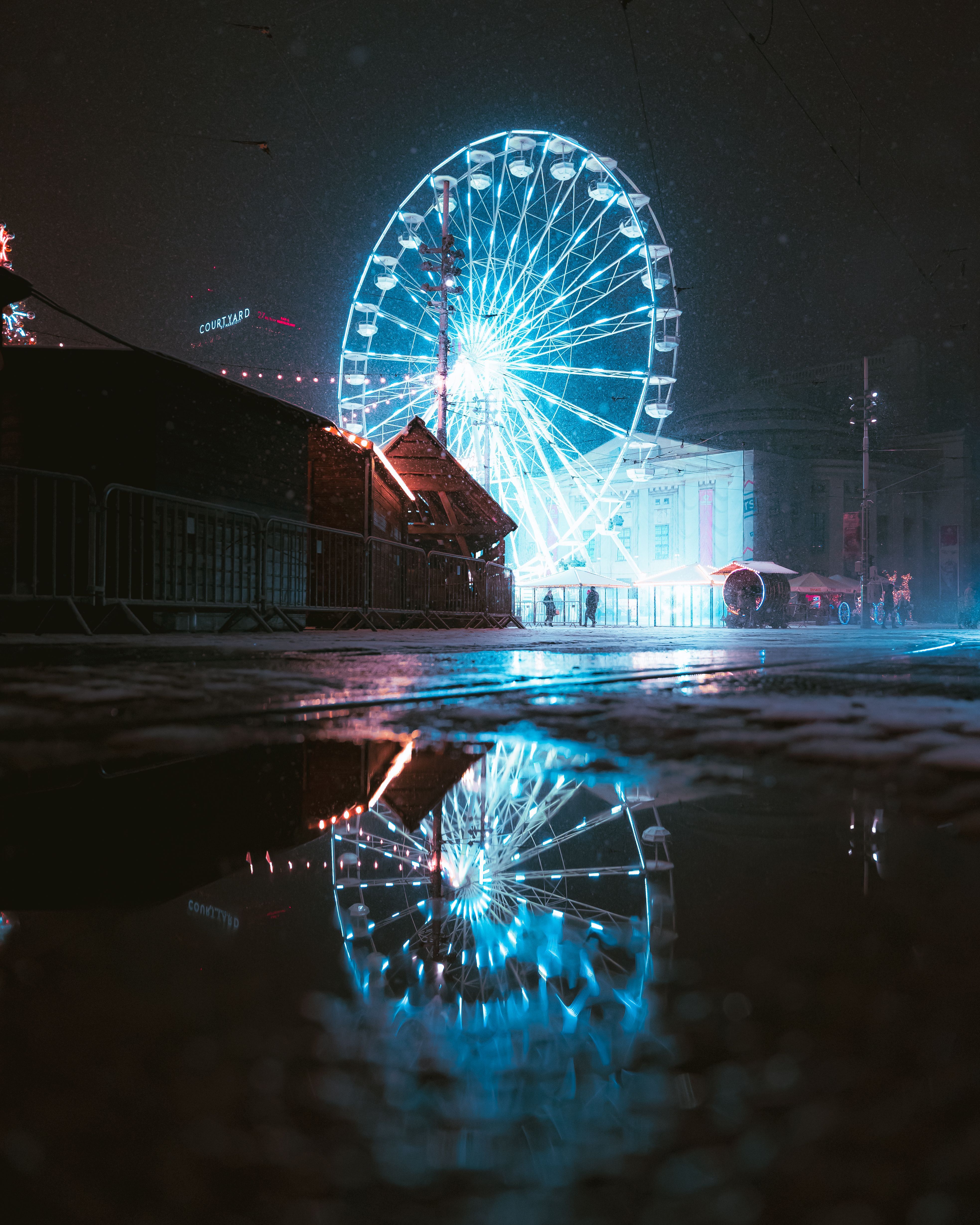 3934x4917 Lit up Ferris Wheel Reflecting in Water · Free