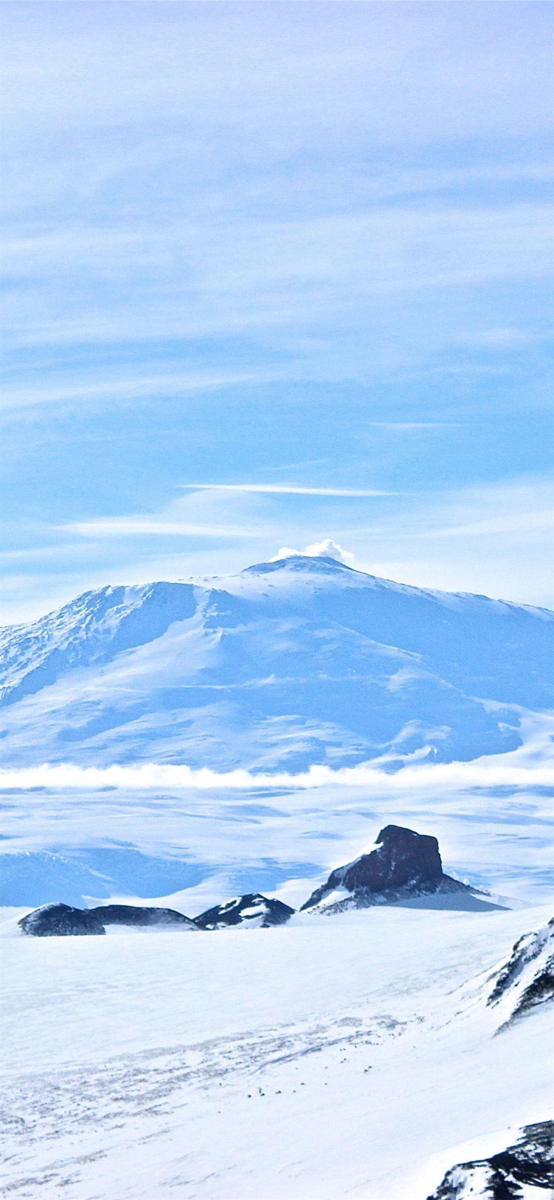 1125x2436 Erebus Antarctica volcano snow winter 5k Nature iPhone X Wallpaper Free Download