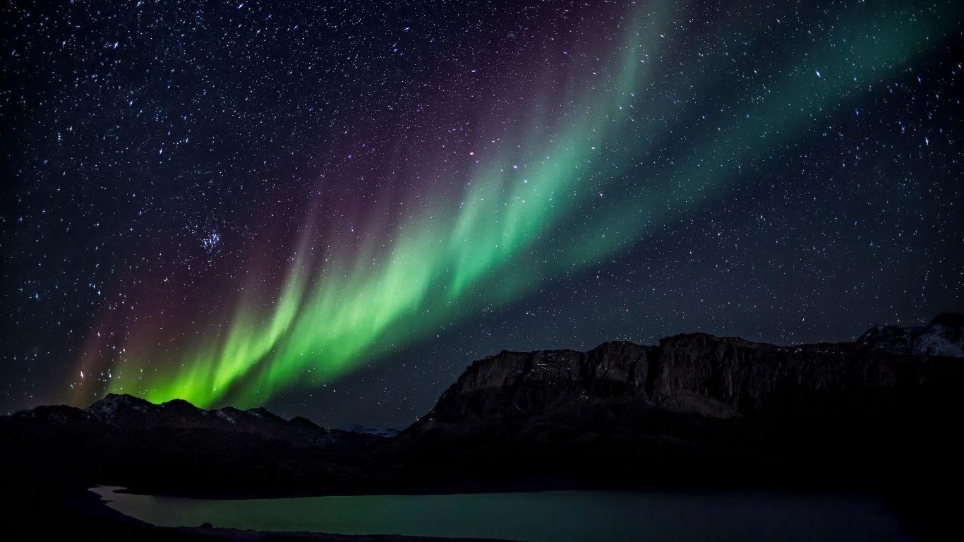 1366x768 Download 1366x768 wallpaper northern lights, colorful, light trails starry night, tablet, laptop, 1366x768 HD image, background, 9889