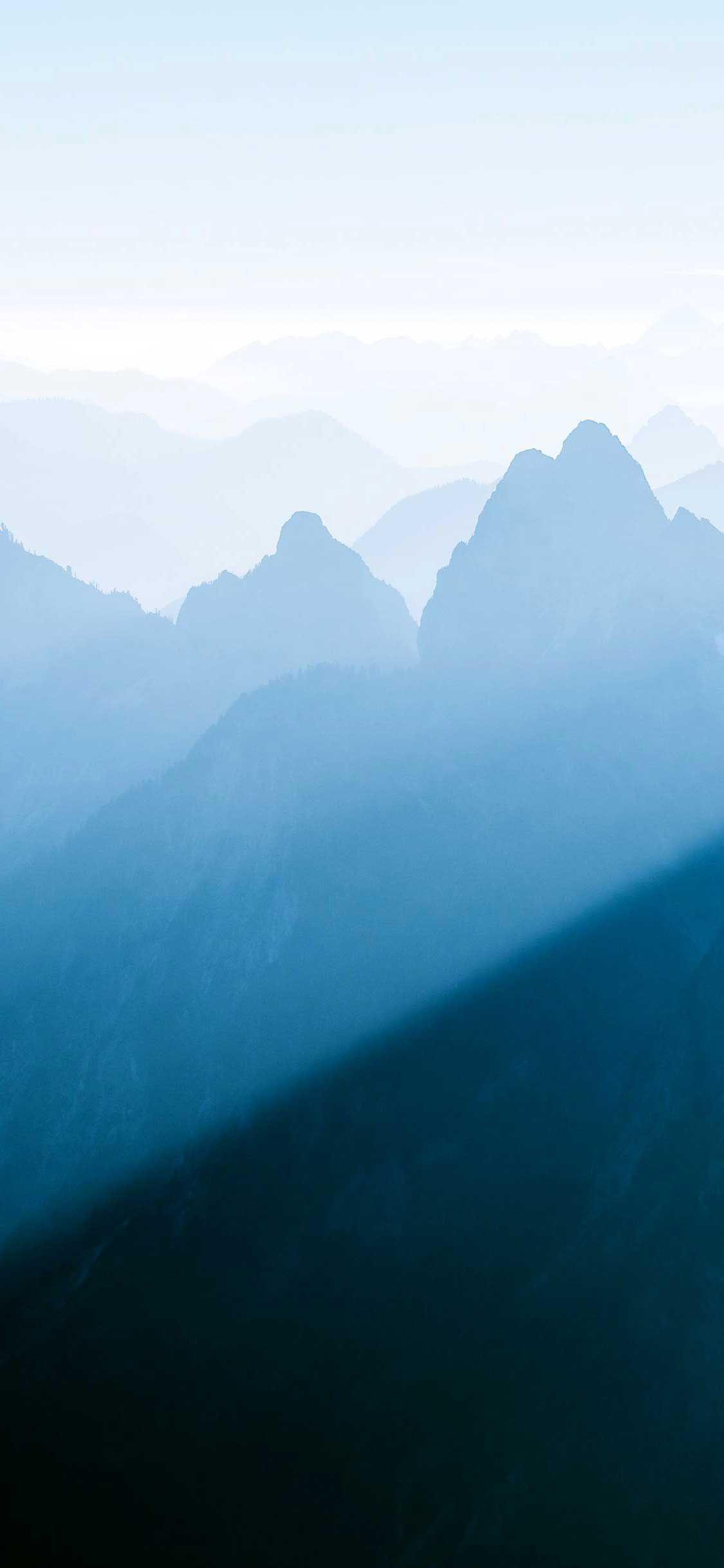 1125x2436 iPhone Pro Wallpaper Mountains cascade range light morning foggy k HD. Cascade range, Cool house designs, Foggy