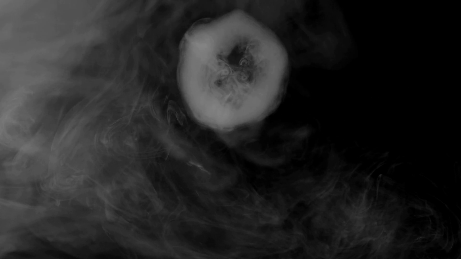1920x1080 SMOKE RING DOUBLE EXPOSURE AGAINST A BLACK, SMOKEY BACKGROUND. IN 4K, 10 BIT, ALL INTRA SLOW MOTION AT 60 FPS. Stock Video Footage