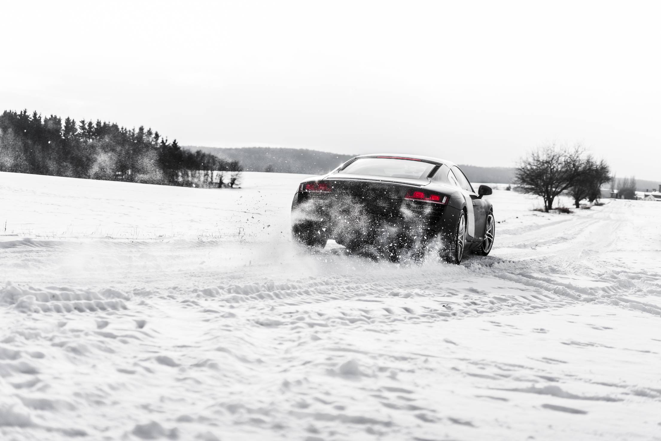 2210x1473 Supercar Drifting on a Snow Covered Road. Free Car Photo