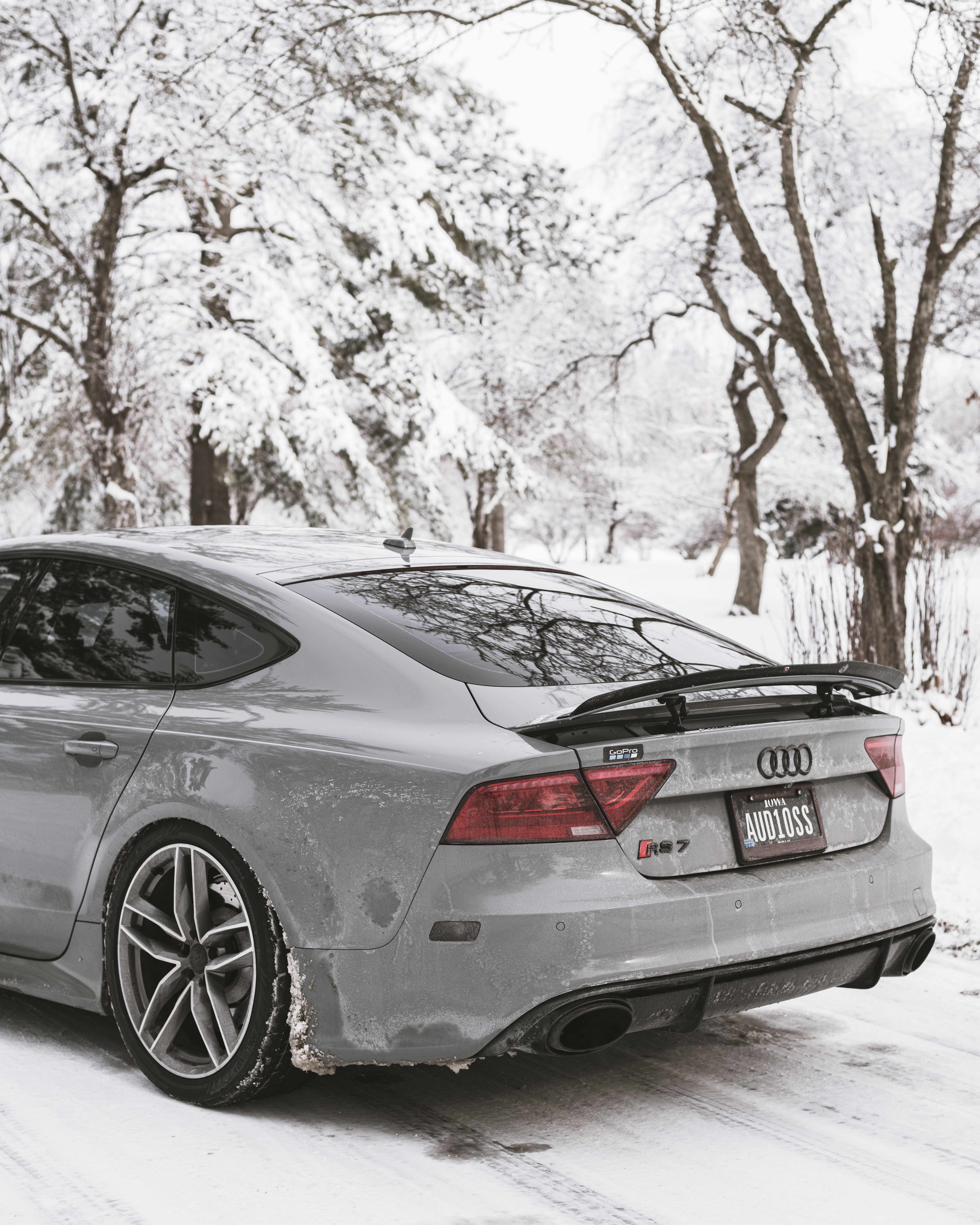 5504x6880 A Gray Audi S7 on a Snow Covered Road · Free