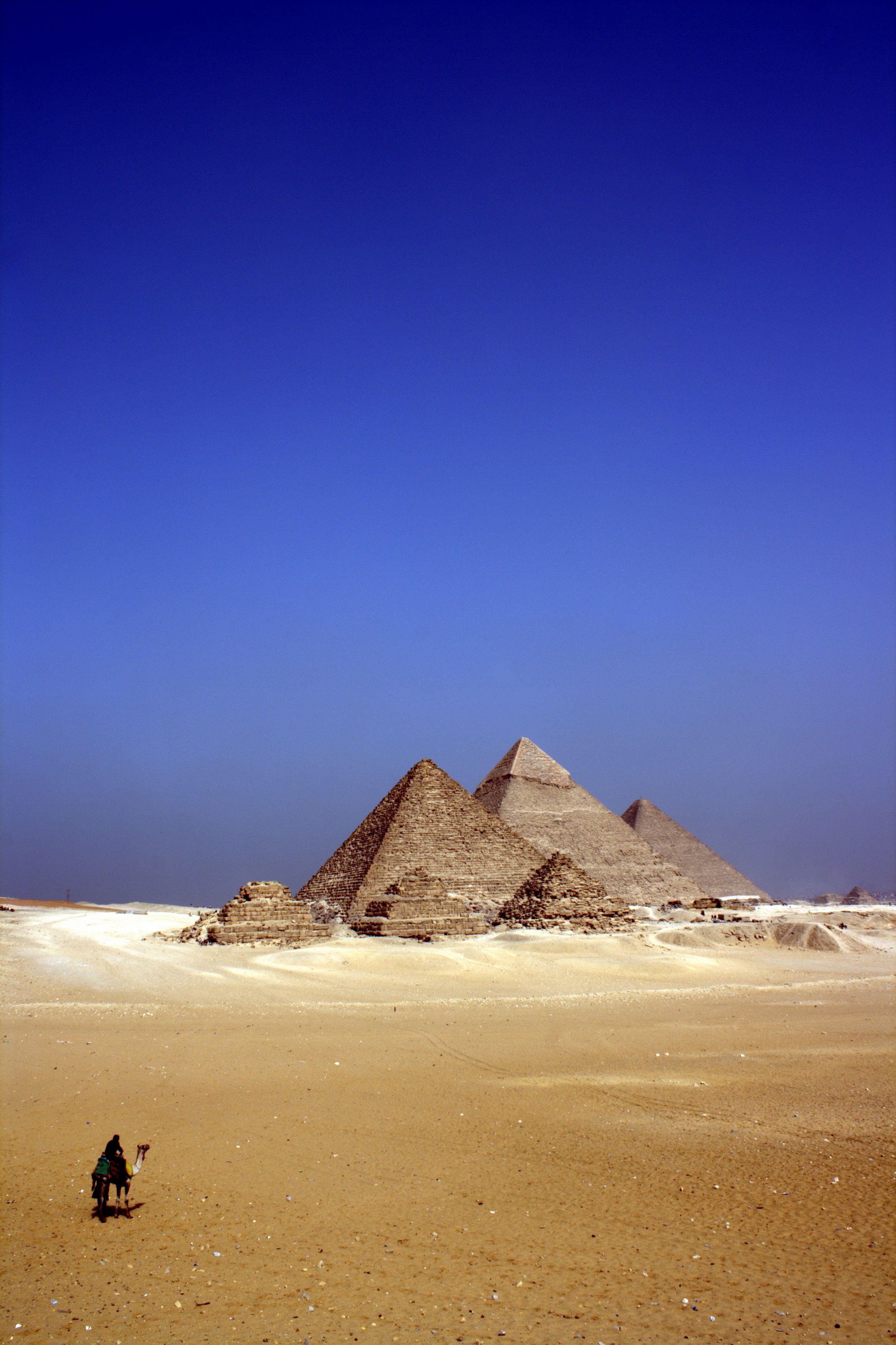 2602x3906 Grey Concrete Pyramids on the Middle of the Dessert during Daytime · Free