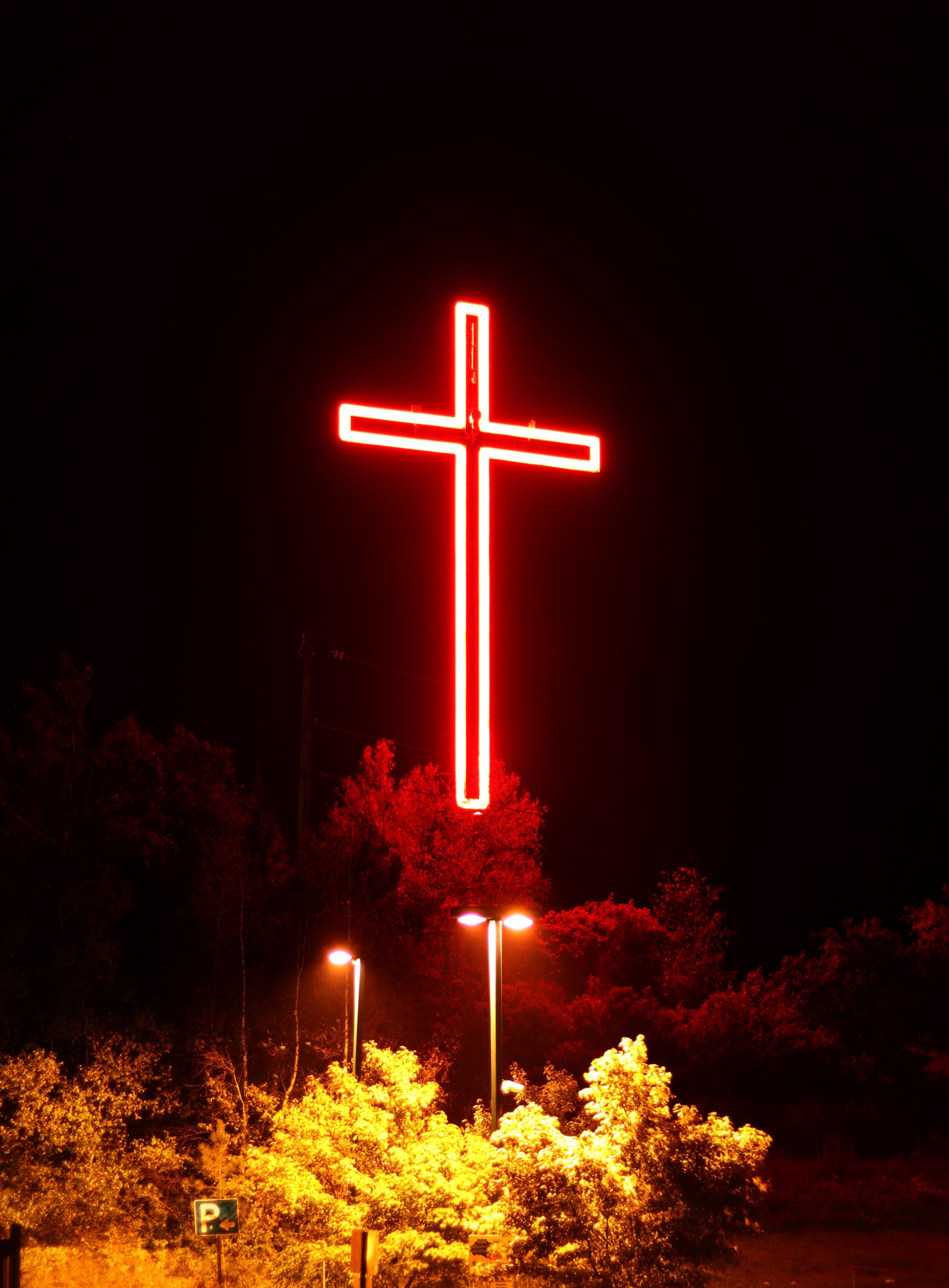 3598x4883 Bright Red Neon Cross Illuminates Night Scene · Free
