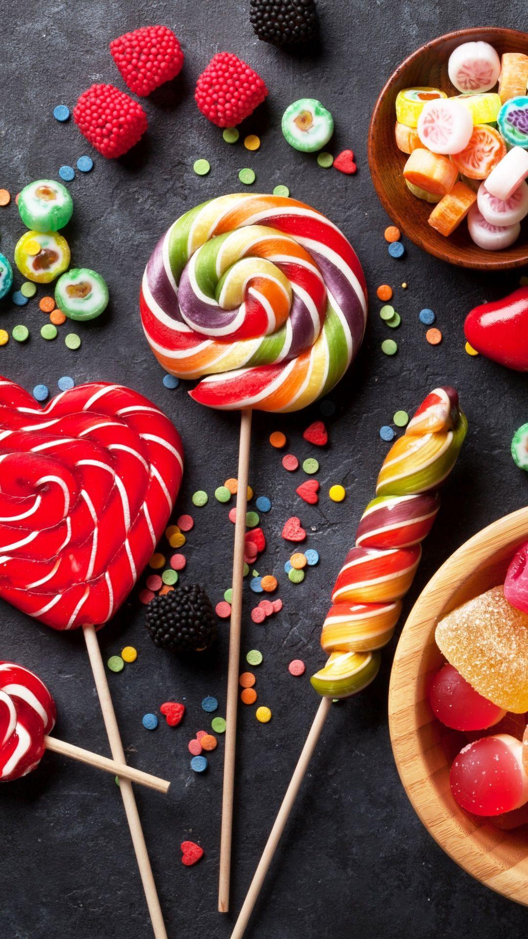1080x1920 Candy Lollipops Wallpaper