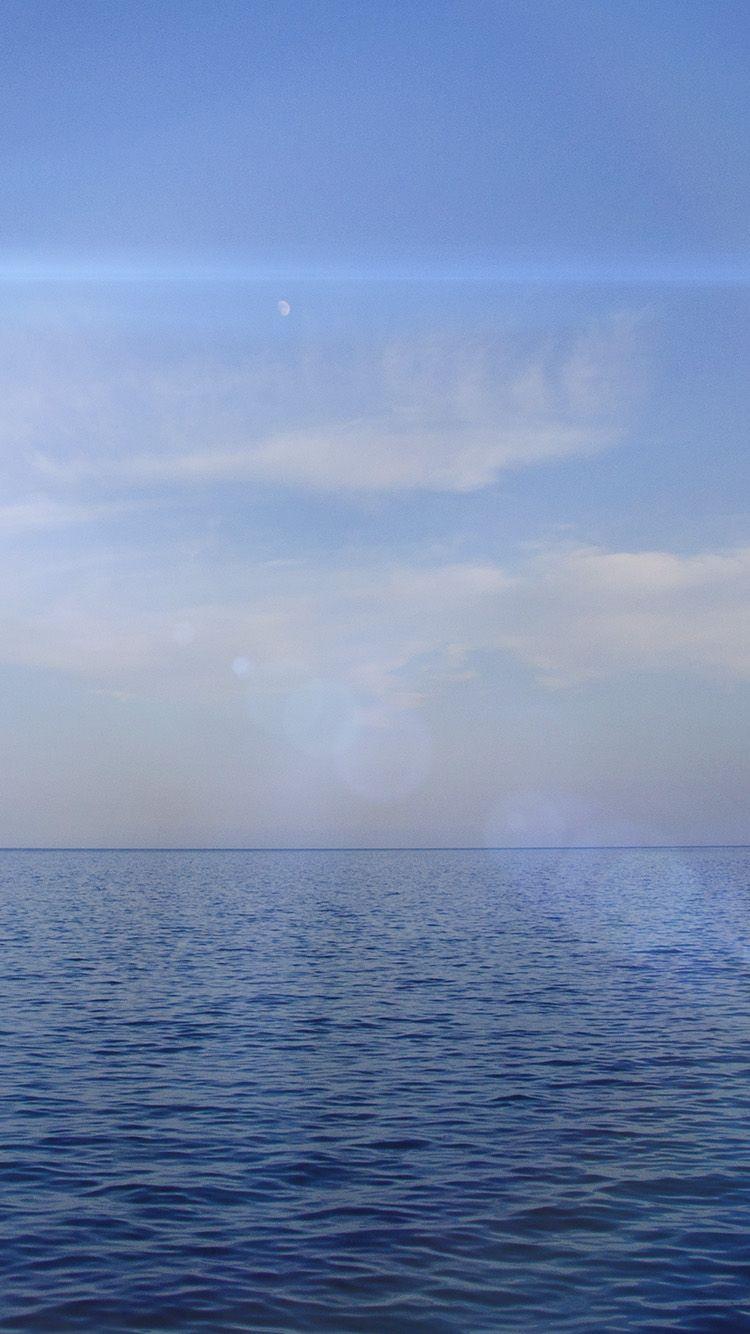 750x1334 Sea Blue Ocean Sky Nature Flare Wallpaper