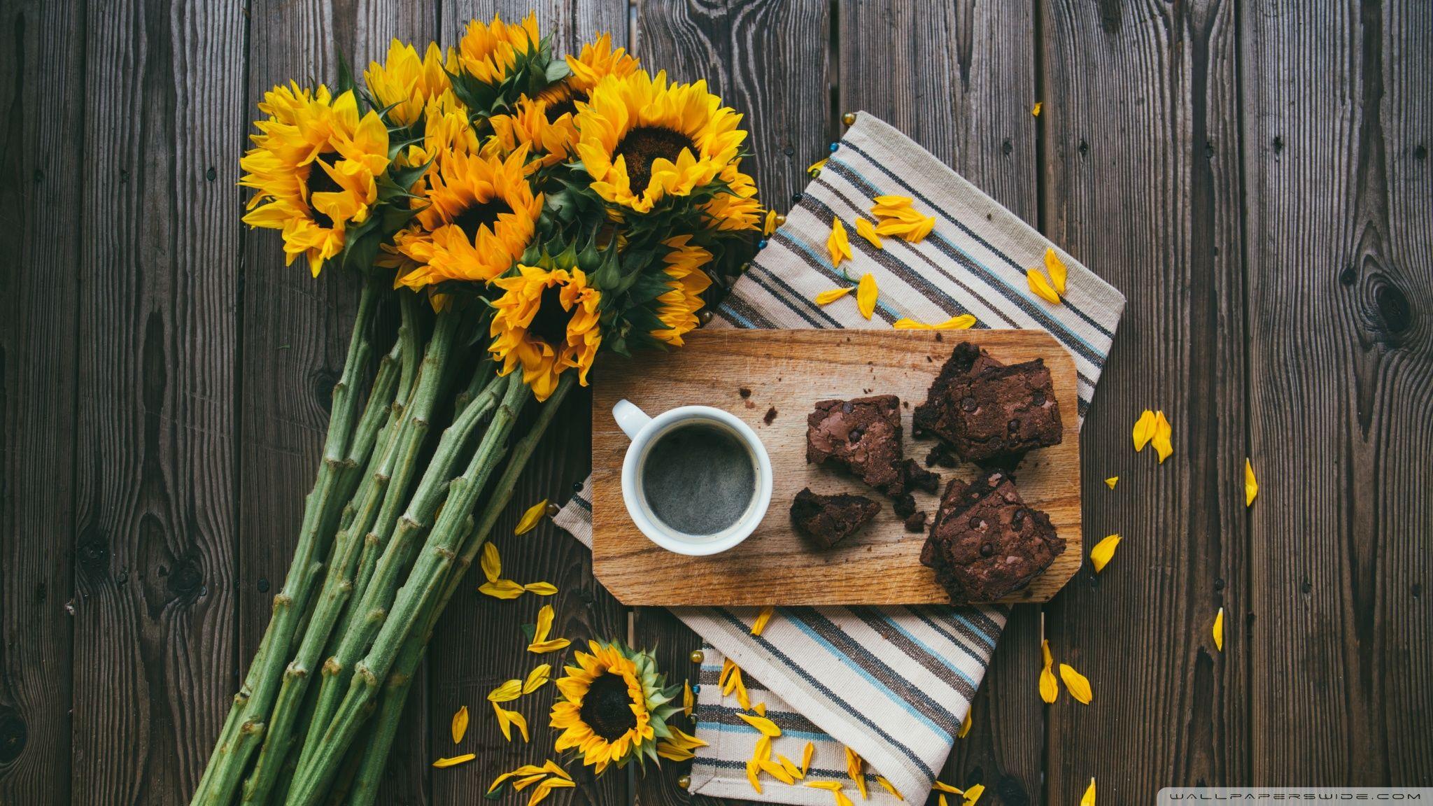 2048x1152 Sunflowers, Coffee Mug, Brownies, Wooden Table ❤ 4K HD Desktop