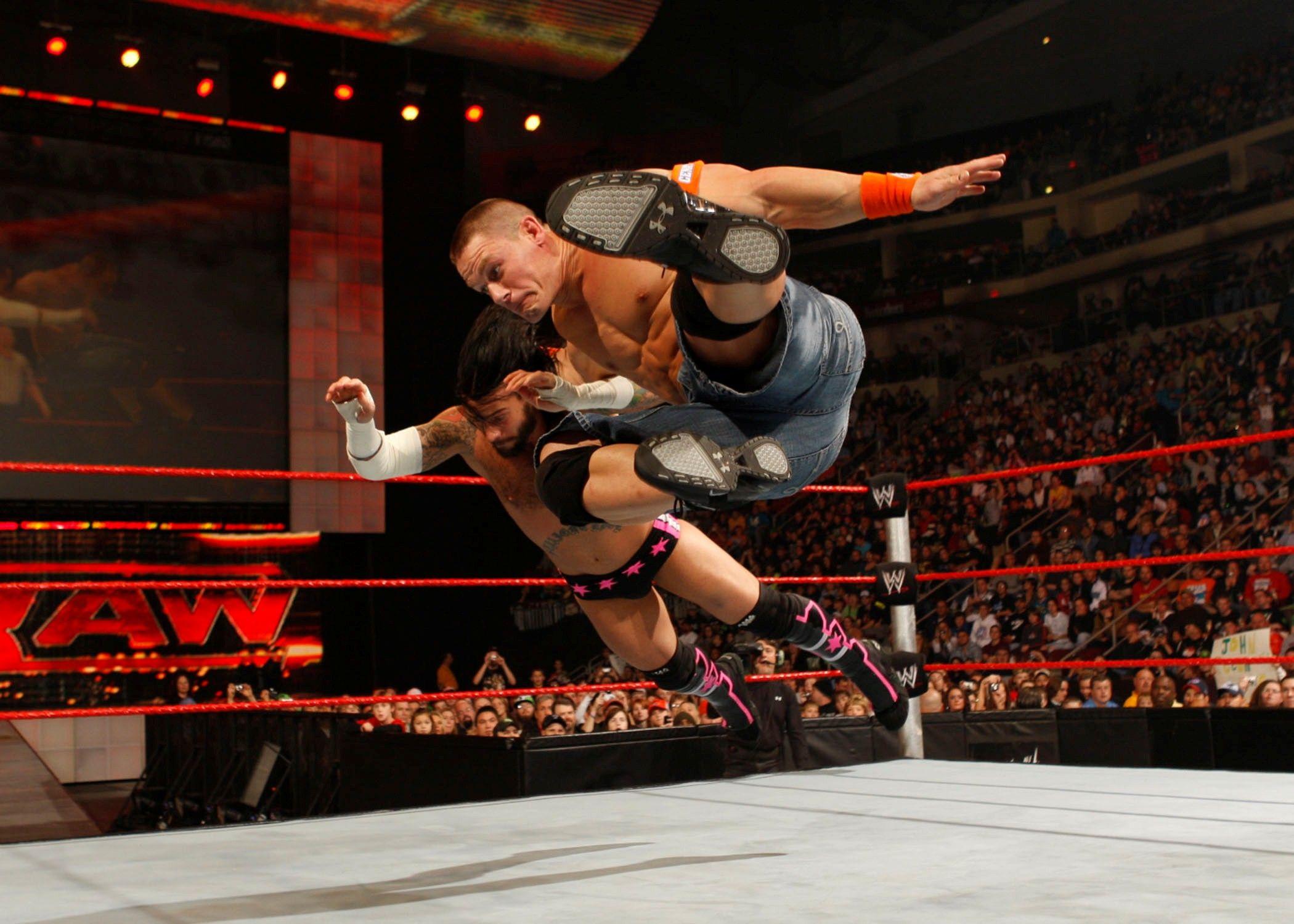 2100x1500 John Wrestlers Fighting In The Ring Wallpaper & Background Download