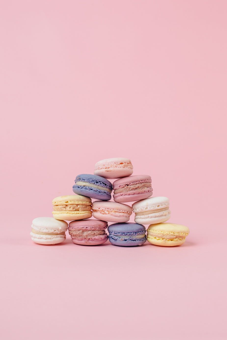 925x1388 Browse Free HD Image of Pastel Macaron Pyramid On Pink Portrait