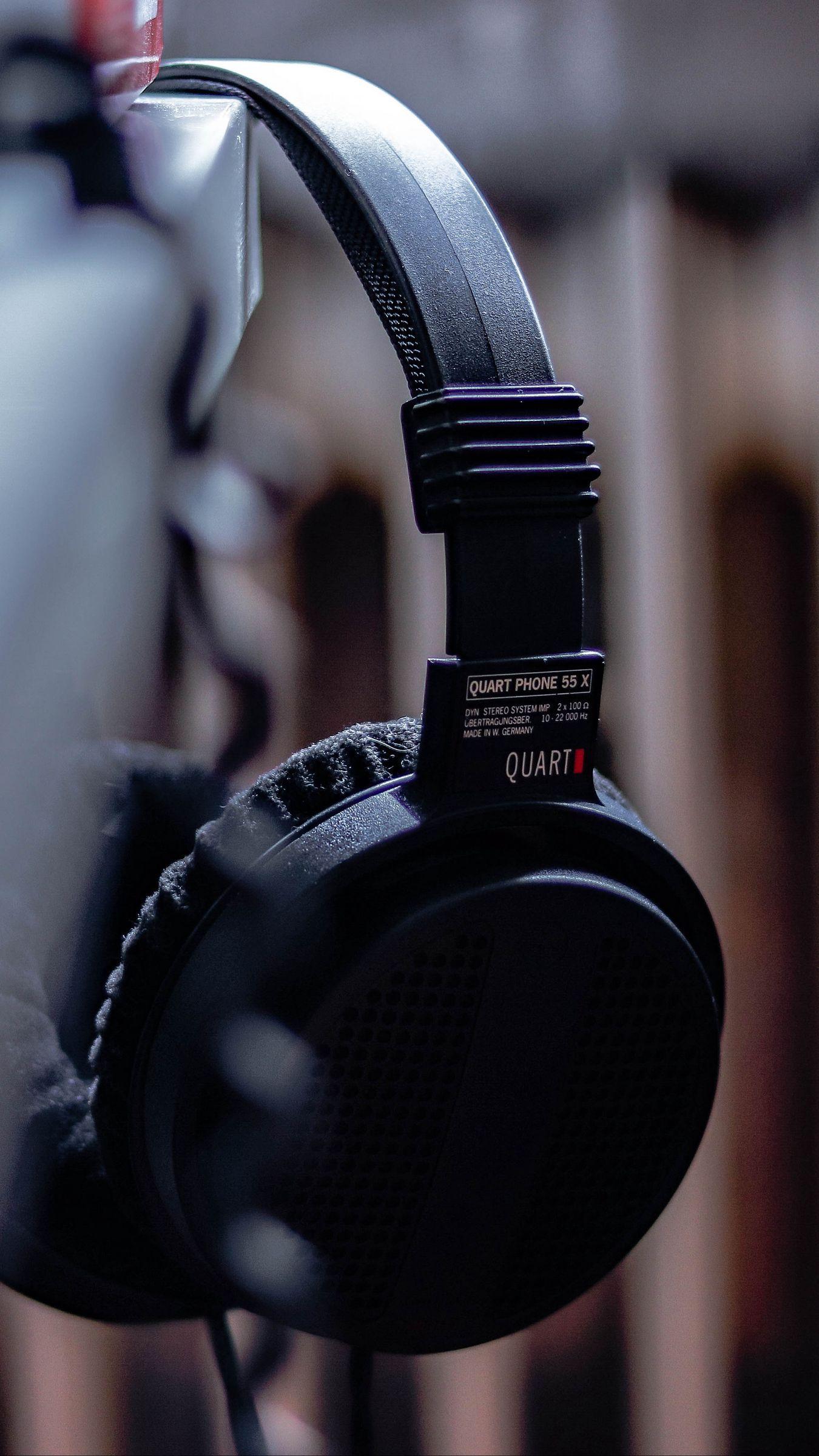 1350x2400 Download wallpaper 1350x2400 headphones, black, music, audio, electronics iphone 8+/7+/6s+/for parallax HD background