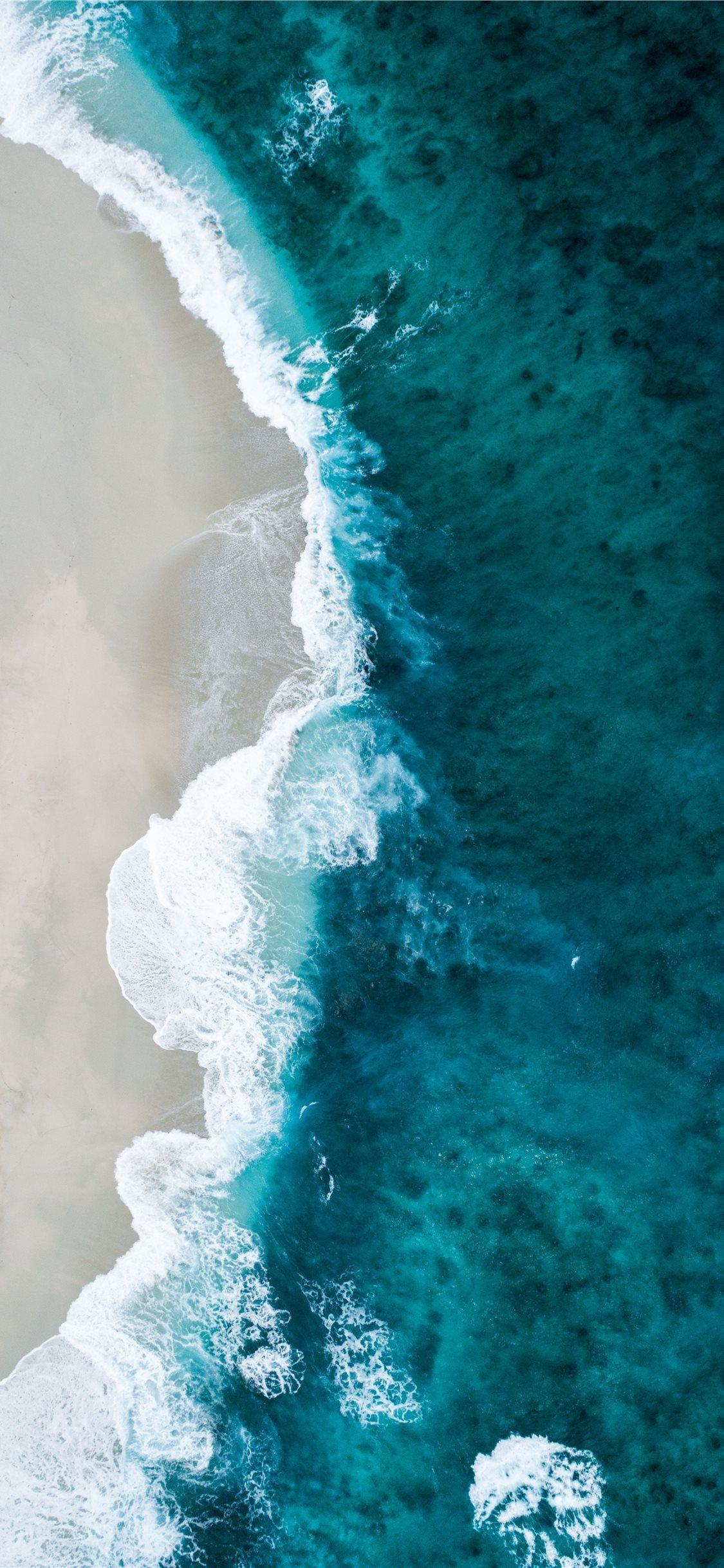 1125x2436 aerial photo of seashore. Ocean picture, Ocean wallpaper, Beach image