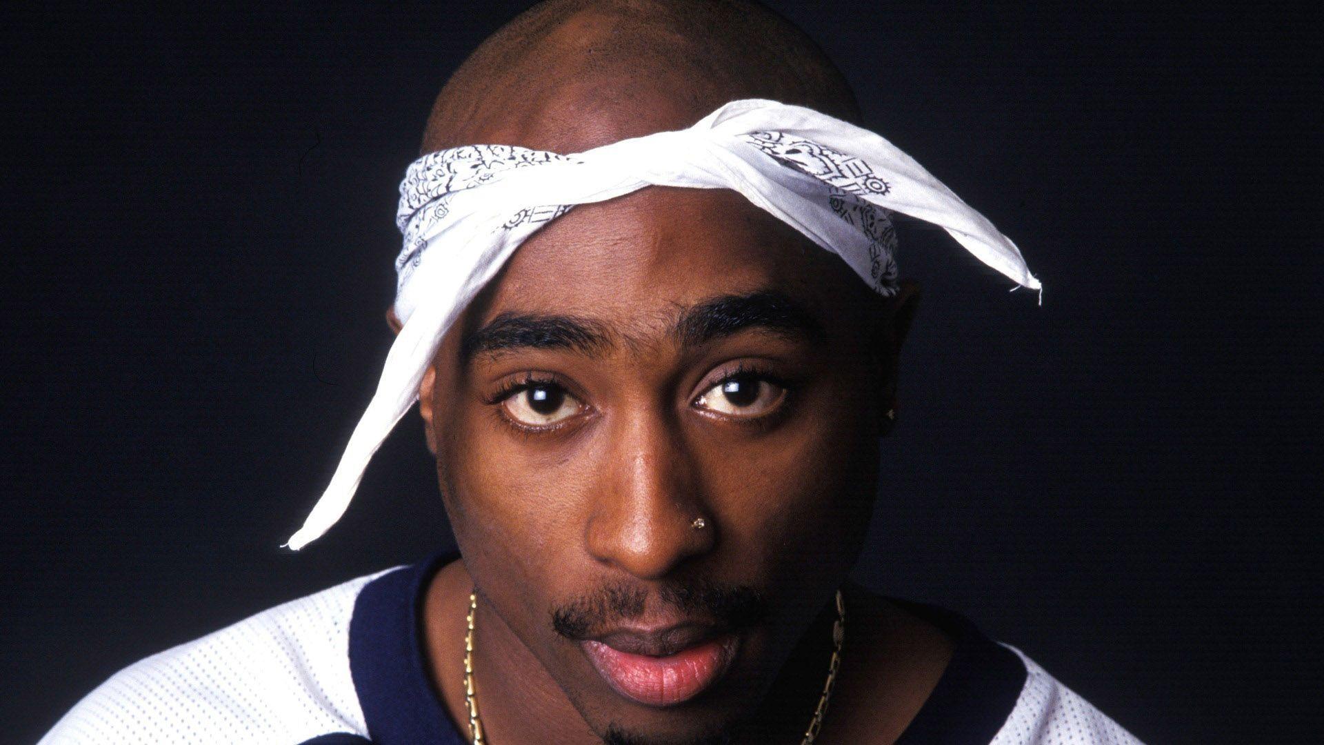1920x1080 2Pac Tupac Shakur Is Wearing White T Shirt Having Nose Pin In Blue Background HD Music Wallpaper