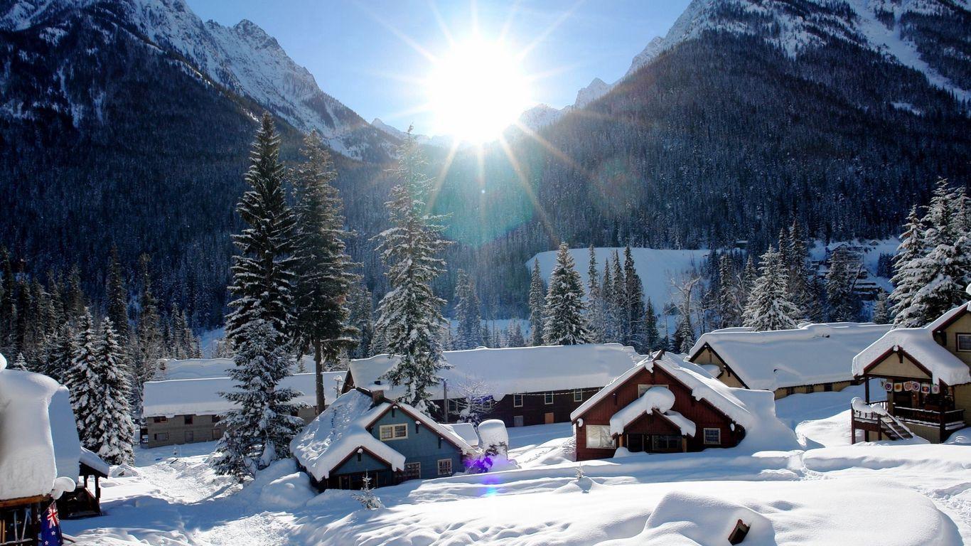 1366x768 Download wallpaper 1366x768 mountains, houses, snow, winter, beautiful tablet, laptop HD background