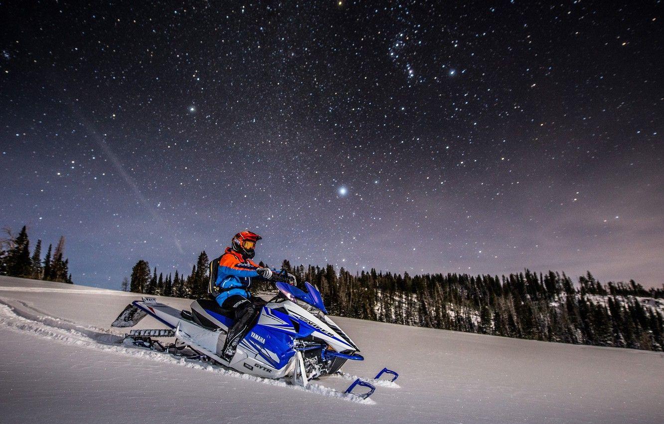 Photo of Person Riding Snowmobile  Free Stock Photo