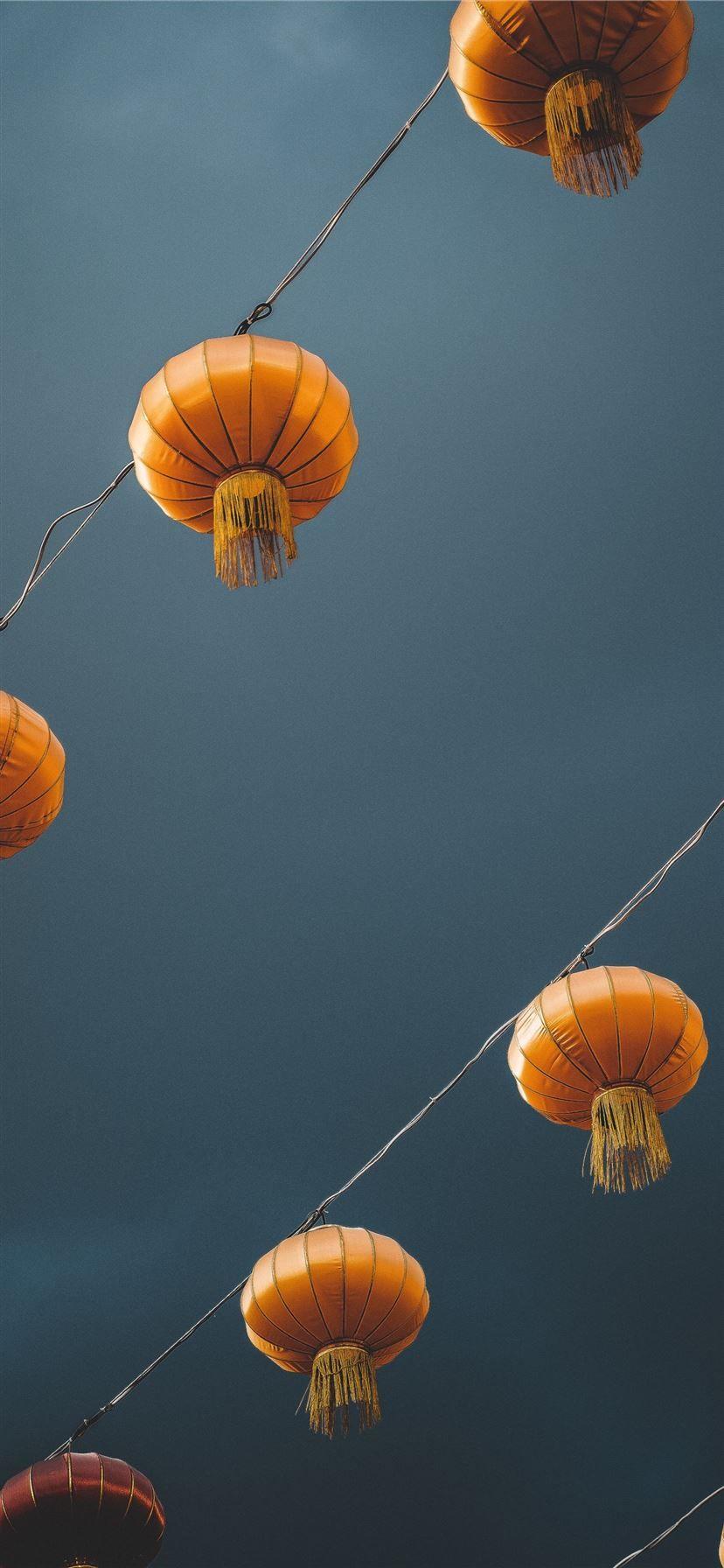 1125x2436 low angle photography of lantern iPhone 11 Wallpaper Free Download