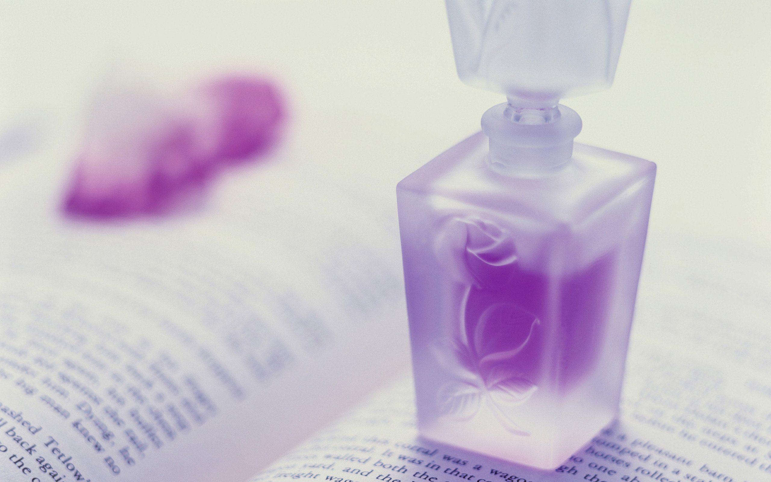 2560x1600 Purple perfume bottle wallpaperx1600