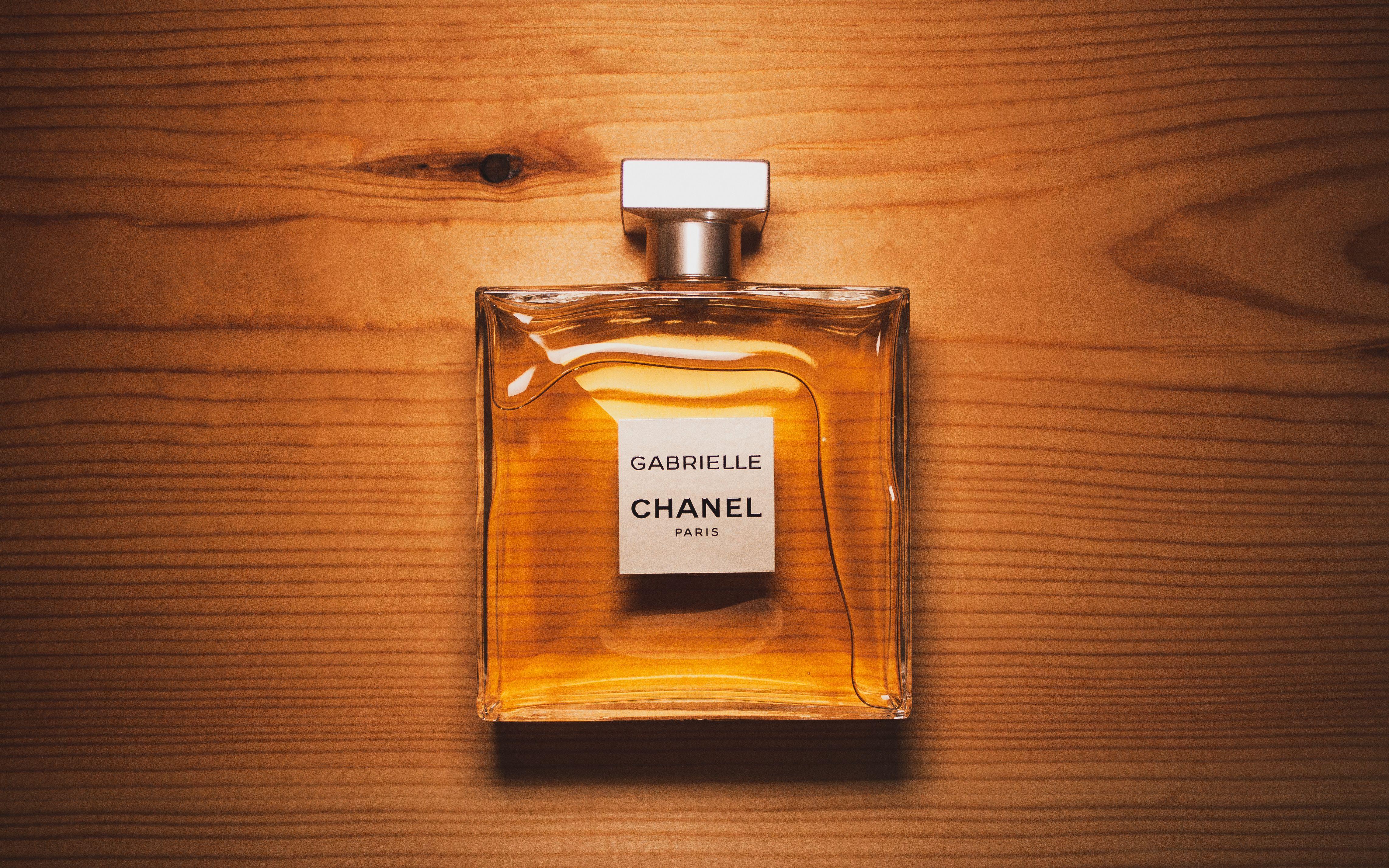 4567x2854 Clear Glass Perfume Bottle on Brown Surface · Free